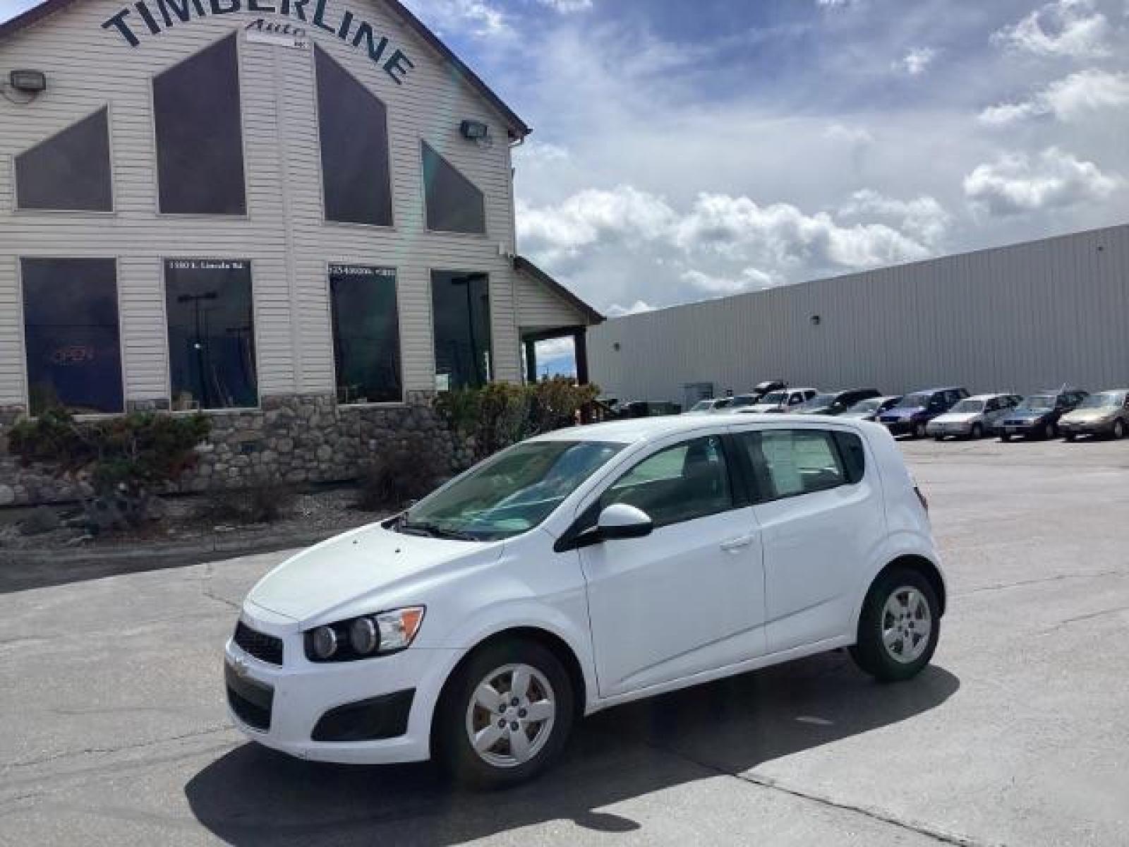 2016 Summit White Chevrolet Sonic LS Auto 5-Door (1G1JA6SH6G4) with an 1.8L L4 DOHC 24V engine, 6-Speed Automatic transmission, located at 1235 N Woodruff Ave., Idaho Falls, 83401, (208) 523-1053, 43.507172, -112.000488 - The 2016 Chevy Sonic LS is a compact car known for its fuel efficiency, nimble handling, and decent amount of standard features. Here's an overview of its key features: Engine Options: The Sonic LS typically comes with a 1.8-liter four-cylinder engine, although some models may have a turbocharged 1 - Photo #0