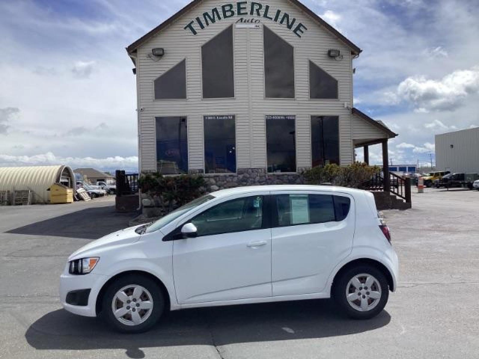 2016 Summit White Chevrolet Sonic LS Auto 5-Door (1G1JA6SH6G4) with an 1.8L L4 DOHC 24V engine, 6-Speed Automatic transmission, located at 1235 N Woodruff Ave., Idaho Falls, 83401, (208) 523-1053, 43.507172, -112.000488 - The 2016 Chevy Sonic LS is a compact car known for its fuel efficiency, nimble handling, and decent amount of standard features. Here's an overview of its key features: Engine Options: The Sonic LS typically comes with a 1.8-liter four-cylinder engine, although some models may have a turbocharged 1 - Photo #1
