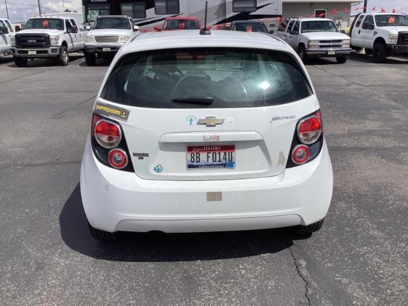 2016 Summit White Chevrolet Sonic LS Auto 5-Door (1G1JA6SH6G4) with an 1.8L L4 DOHC 24V engine, 6-Speed Automatic transmission, located at 1235 N Woodruff Ave., Idaho Falls, 83401, (208) 523-1053, 43.507172, -112.000488 - The 2016 Chevy Sonic LS is a compact car known for its fuel efficiency, nimble handling, and decent amount of standard features. Here's an overview of its key features: Engine Options: The Sonic LS typically comes with a 1.8-liter four-cylinder engine, although some models may have a turbocharged 1 - Photo #3