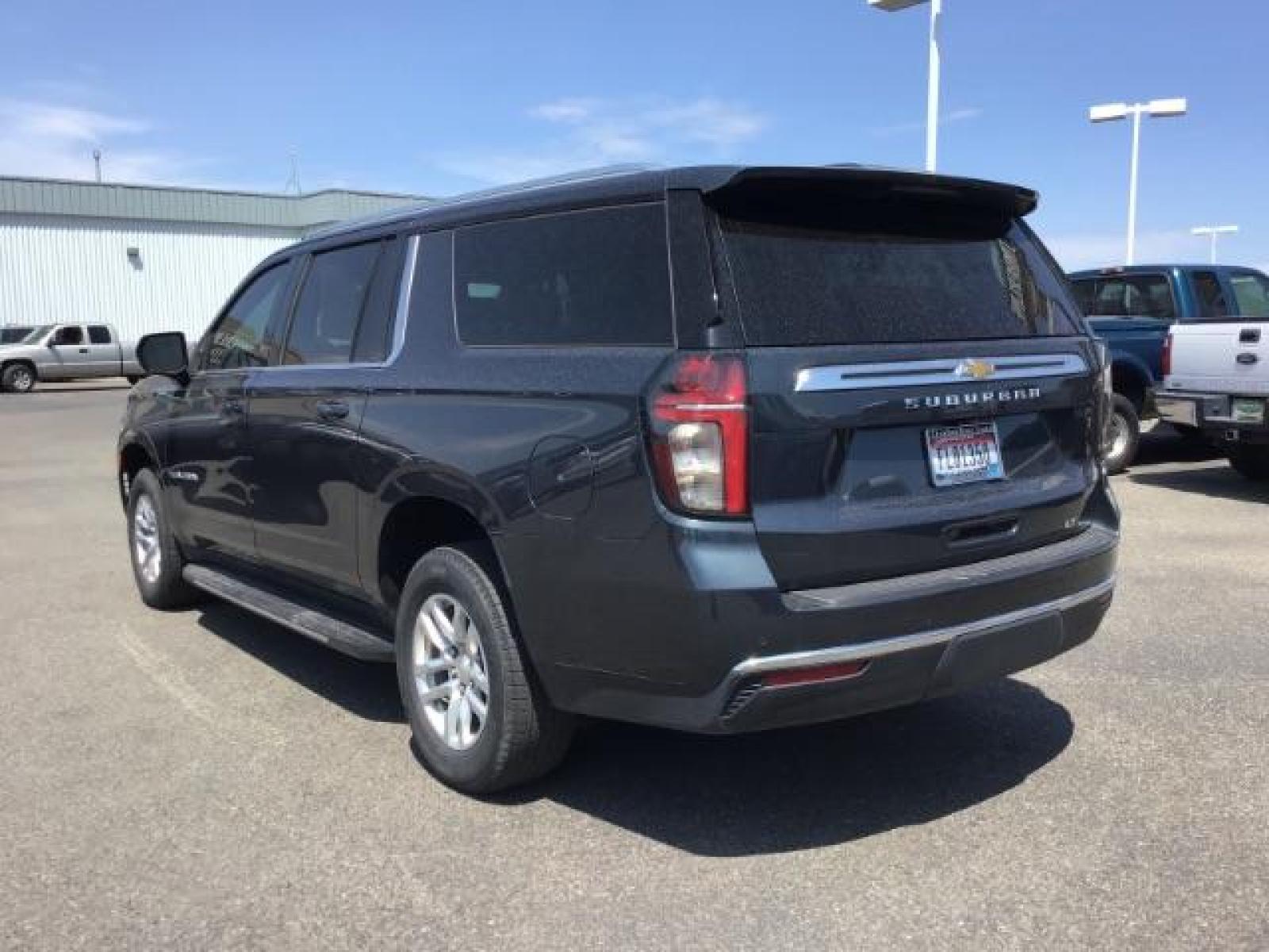 2021 GRAY /BLACK Chevrolet Suburban LT 4WD (1GNSKCKDXMR) with an 5.3L V8 OHV 16V engine, 10-Speed Automatic transmission, located at 1235 N Woodruff Ave., Idaho Falls, 83401, (208) 523-1053, 43.507172, -112.000488 - Photo #3