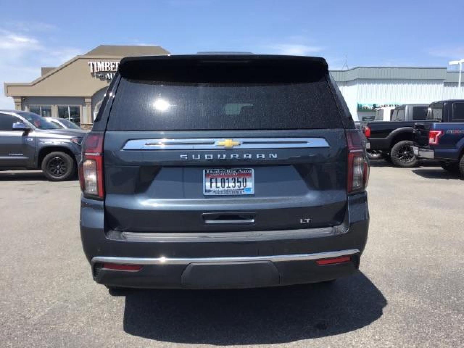 2021 GRAY /BLACK Chevrolet Suburban LT 4WD (1GNSKCKDXMR) with an 5.3L V8 OHV 16V engine, 10-Speed Automatic transmission, located at 1235 N Woodruff Ave., Idaho Falls, 83401, (208) 523-1053, 43.507172, -112.000488 - Photo #4