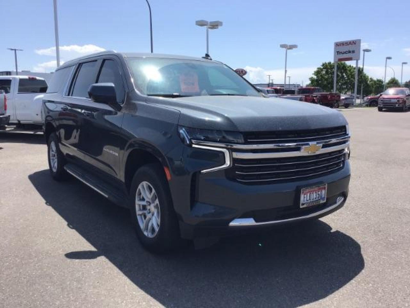 2021 GRAY /BLACK Chevrolet Suburban LT 4WD (1GNSKCKDXMR) with an 5.3L V8 OHV 16V engine, 10-Speed Automatic transmission, located at 1235 N Woodruff Ave., Idaho Falls, 83401, (208) 523-1053, 43.507172, -112.000488 - Photo #7