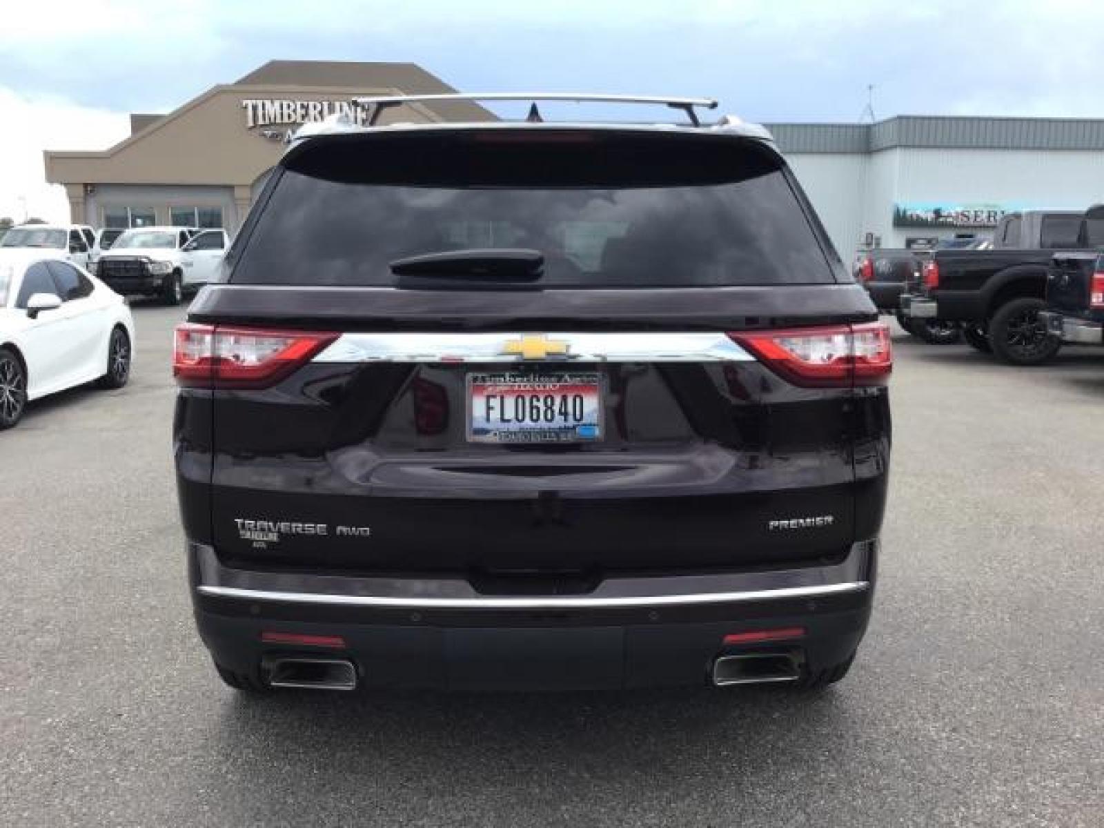 2020 Black Cherry Metallic /Jet Black/Dark Galvanized, leather Chevrolet Traverse Premier AWD (1GNEVKKW6LJ) with an 3.6L V6 DOHC 24V engine, 9-Speed Automatic transmission, located at 1235 N Woodruff Ave., Idaho Falls, 83401, (208) 523-1053, 43.507172, -112.000488 - Leather, 3rd row seating, rear entertainment, heated and cooled seats. At Timberline Auto it is always easy to find a great deal on your next vehicle! Our experienced sales staff can help find the right vehicle that will fit your needs. Our knowledgeable finance department has options for almost an - Photo #4