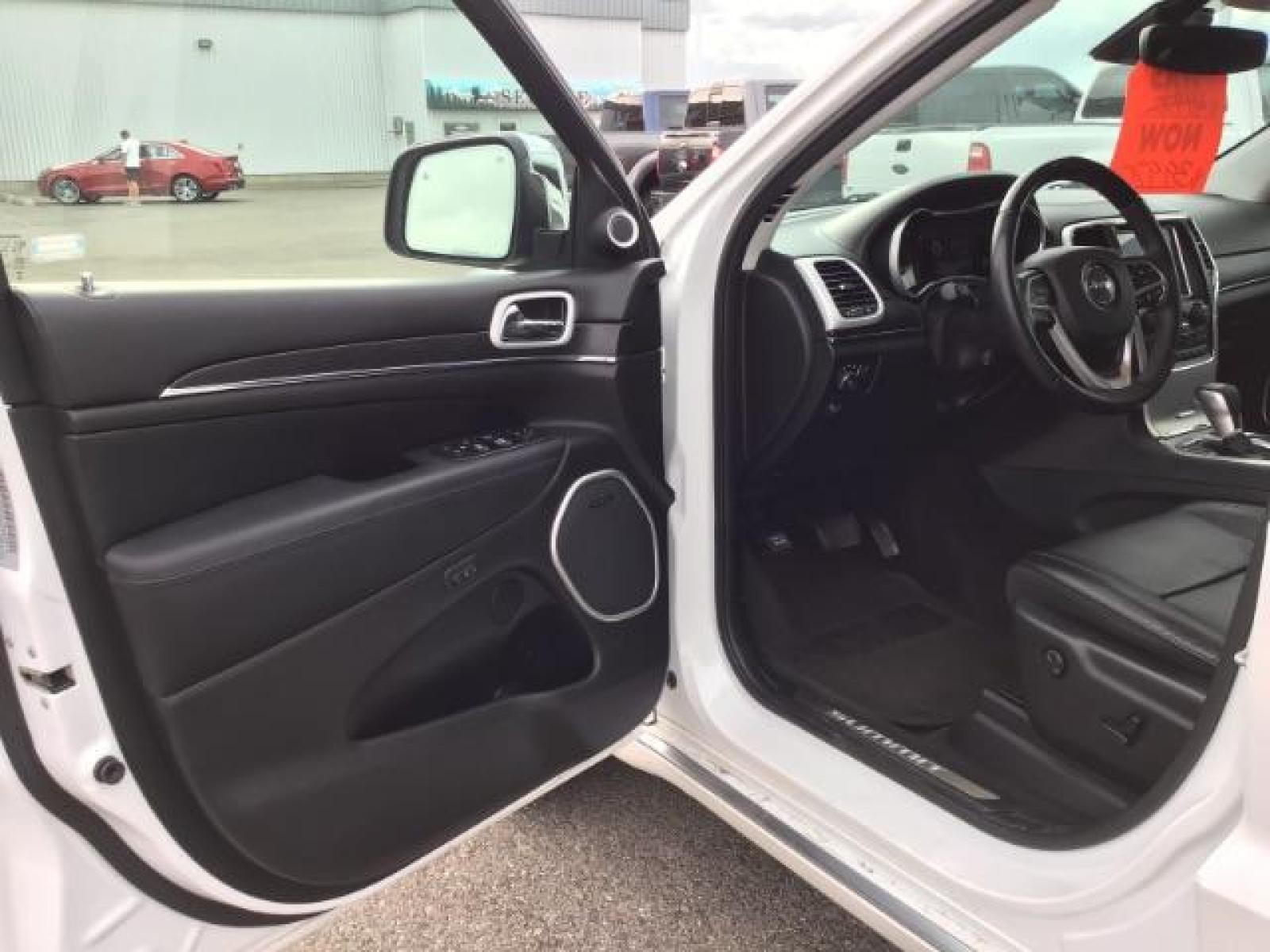 2018 Bright White Clear Coat /Black, leather Jeep Grand Cherokee Summit 4WD (1C4RJFJTXJC) with an 5.7L V8 OHV 16V engine, 8-Speed Automatic transmission, located at 1235 N Woodruff Ave., Idaho Falls, 83401, (208) 523-1053, 43.507172, -112.000488 - Equipped with the 5.7 V8 Hemi, adjustable ride height, factory 20 inch premium wheels, paint matched bumpers, SUMMIT premium leather interior, comfort and safety options, terrain select, and a double sunroof! At timberline Auto it is always easy to find a great deal on your next vehicle! Our exper - Photo #9