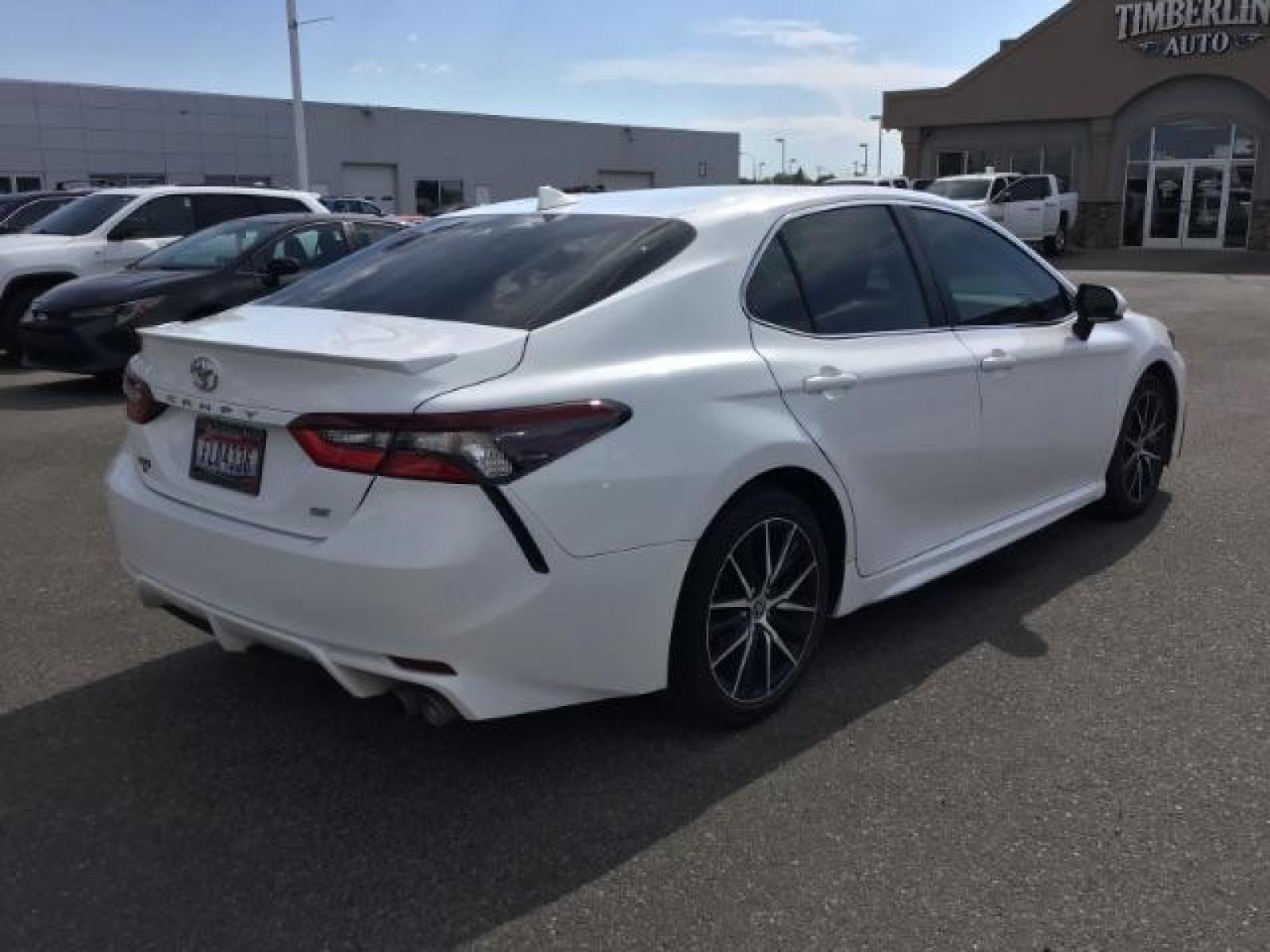 2021 Super White /Ash, leatherette/cloth Toyota Camry SE (4T1G11AKXMU) with an 2.5L L4 DOHC 16V engine, 8-Speed Automatic transmission, located at 1235 N Woodruff Ave., Idaho Falls, 83401, (208) 523-1053, 43.507172, -112.000488 - This is a very roomy full sized sedan offering many options including but not limited to front collision sensors, a backup camera with guide lines, and phone projection. This vehicle is in brand new condition at a used price! At Timberline Auto it is always easy to find a great deal on your next veh - Photo #5