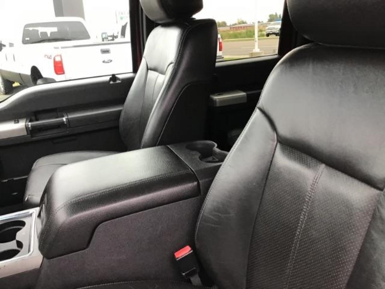 2012 MAROON /Black Leather Interior Ford F-350 SD Lariat Crew Cab 4WD (1FT8W3BTXCE) with an 6.7L V8 OHV 16V DIESEL engine, 6-Speed Automatic transmission, located at 1235 N Woodruff Ave., Idaho Falls, 83401, (208) 523-1053, 43.507172, -112.000488 - This 2012 F350 Lariat, has the 6.7L motor. Only has 103,372 miles. It is a flat bed. It comes with black leather seats, sunroof, navigation, heated and cooled seats,, and the exterior and interior are in great condition. At Timberline Auto it is always easy to find a great deal on your next vehicle - Photo #9