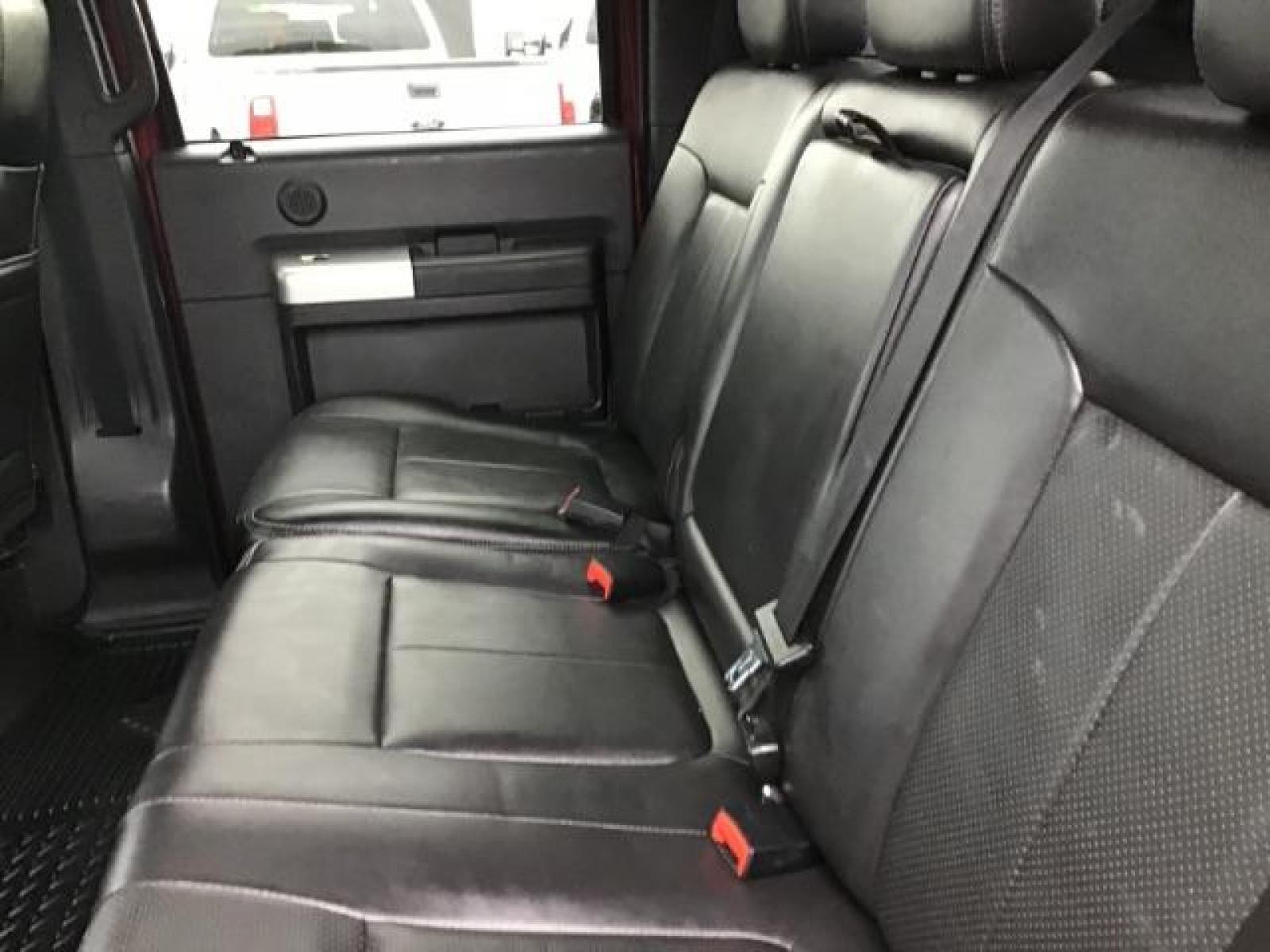 2012 MAROON /Black Leather Interior Ford F-350 SD Lariat Crew Cab 4WD (1FT8W3BTXCE) with an 6.7L V8 OHV 16V DIESEL engine, 6-Speed Automatic transmission, located at 1235 N Woodruff Ave., Idaho Falls, 83401, (208) 523-1053, 43.507172, -112.000488 - This 2012 F350 Lariat, has the 6.7L motor. Only has 103,372 miles. It is a flat bed. It comes with black leather seats, sunroof, navigation, heated and cooled seats,, and the exterior and interior are in great condition. At Timberline Auto it is always easy to find a great deal on your next vehicle - Photo #20