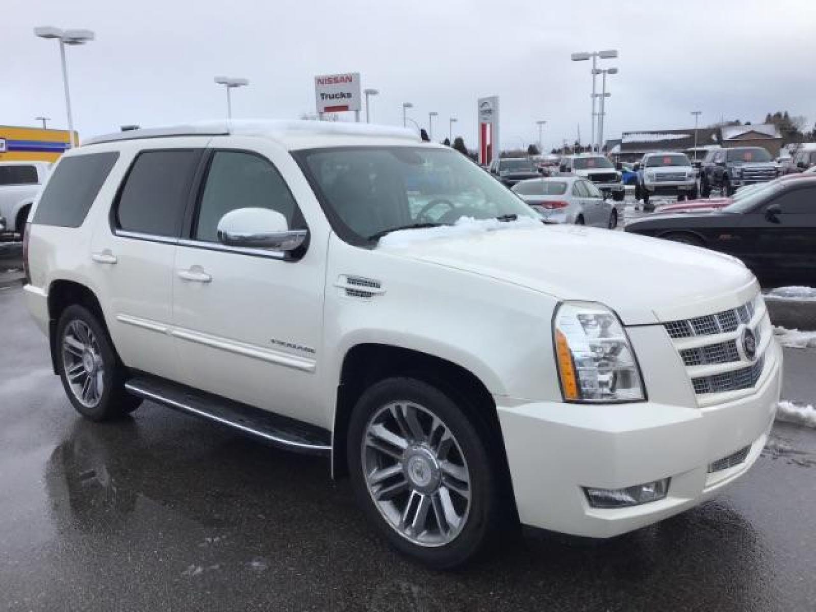 2012 WHITE /WHITE Cadillac Escalade AWD Luxury (1GYS4BEF2CR) with an 6.2L V8 OHV 16V FFV engine, 6-Speed Automatic transmission, located at 1235 N Woodruff Ave., Idaho Falls, 83401, (208) 523-1053, 43.507172, -112.000488 - This 2012 Cadillac Escalade Luxury 4x4, has the 6.2L motor. It has 117,000 miles. Comes with leather interior, heated seats, 3rd row seating, blue tooth audio, sunroof, power seats, and back up camera. At Timberline Auto it is always easy to find a great deal on your next vehicle! Our experienced sa - Photo #5