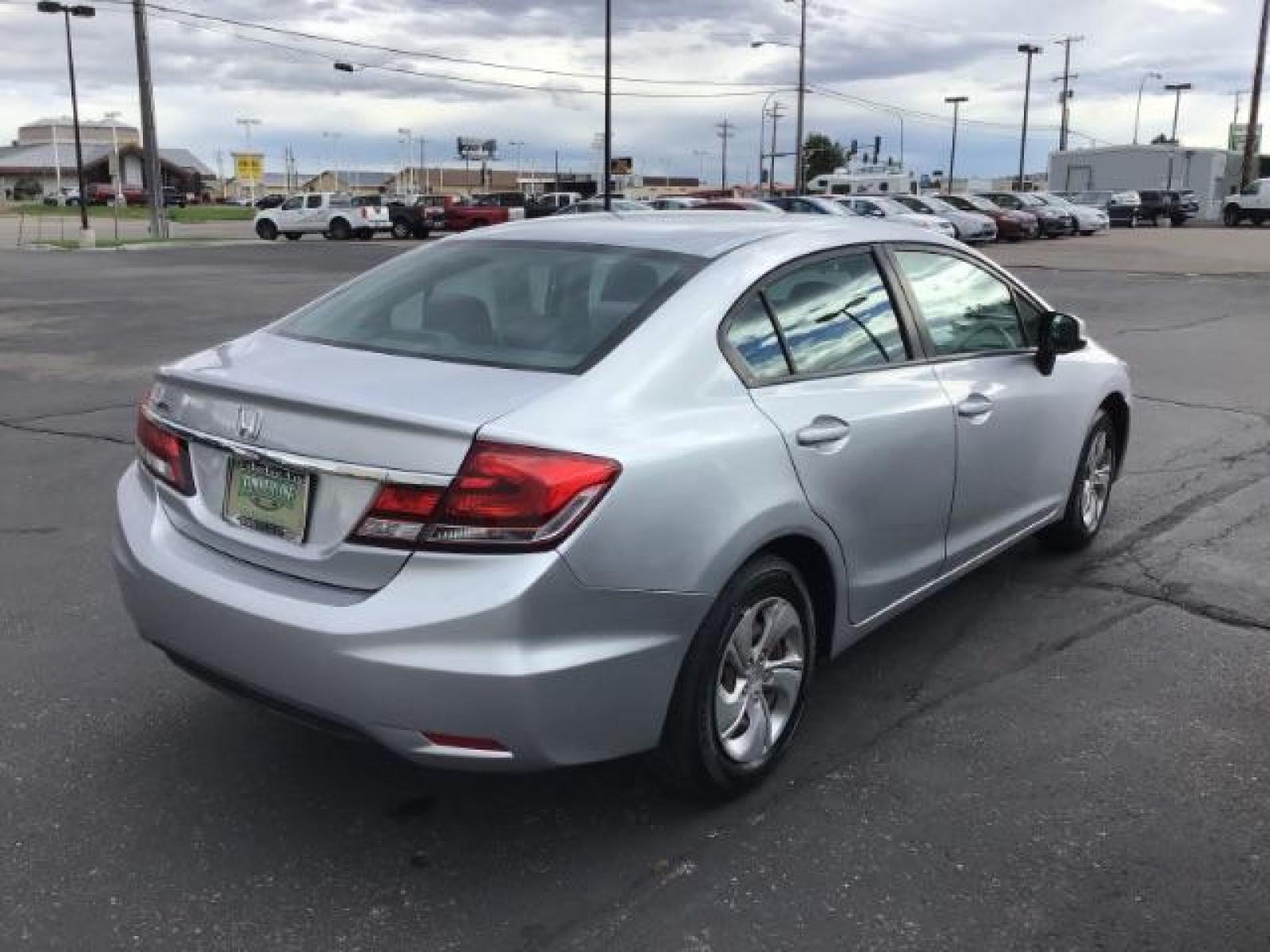 2013 Urban Titanium Metallic /Stone Cloth Interior Honda Civic LX Sedan 5-Speed AT (19XFB2F52DE) with an 1.8L L4 SOHC 16V engine, 5-Speed Automatic transmission, located at 1235 N Woodruff Ave., Idaho Falls, 83401, (208) 523-1053, 43.507172, -112.000488 - At Timberline Auto it is always easy to find a great deal on your next vehicle! Our experienced sales staff can help find the right vehicle will fit your needs. Our knowledgeable finance department has options for almost any credit score. We offer many warranty contract options to protect you new pr - Photo #4