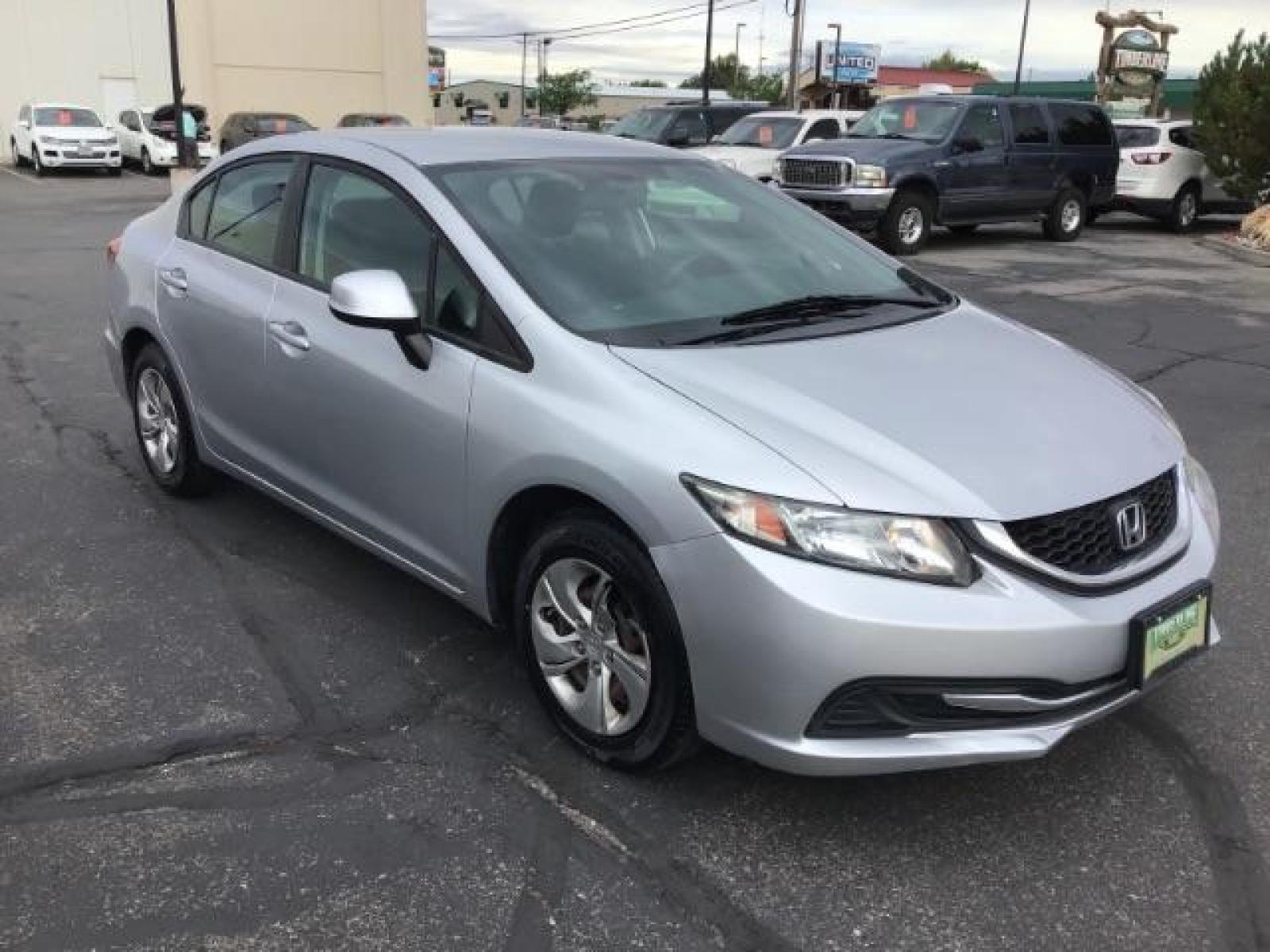 2013 Urban Titanium Metallic /Stone Cloth Interior Honda Civic LX Sedan 5-Speed AT (19XFB2F52DE) with an 1.8L L4 SOHC 16V engine, 5-Speed Automatic transmission, located at 1235 N Woodruff Ave., Idaho Falls, 83401, (208) 523-1053, 43.507172, -112.000488 - At Timberline Auto it is always easy to find a great deal on your next vehicle! Our experienced sales staff can help find the right vehicle will fit your needs. Our knowledgeable finance department has options for almost any credit score. We offer many warranty contract options to protect you new pr - Photo #6