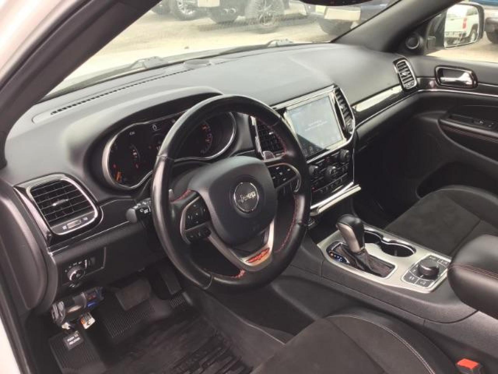 2020 Bright White Clear Coat /Black/Ruby Red, leather Jeep Grand Cherokee Trailhawk 4WD (1C4RJFLG5LC) with an 3.6L V6 DOHC 24V engine, 8-Speed Automatic transmission, located at 1235 N Woodruff Ave., Idaho Falls, 83401, (208) 523-1053, 43.507172, -112.000488 - Leather and loaded, heated and cooled seats, blind spot monitors, AWD, low miles. At Timberline Auto it is always easy to find a great deal on your next vehicle! Our experienced sales staff can help find the right vehicle that will fit your needs. Our knowledgeable finance department has options for - Photo #10