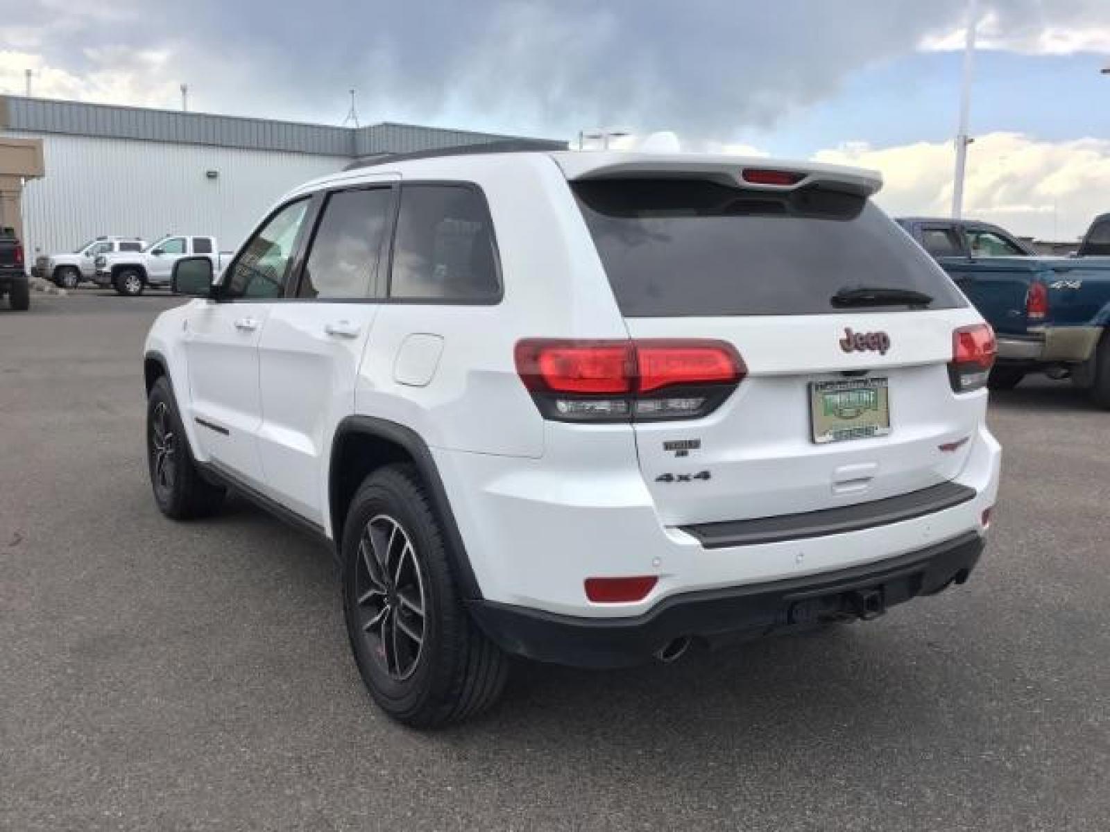 2020 Bright White Clear Coat /Black/Ruby Red, leather Jeep Grand Cherokee Trailhawk 4WD (1C4RJFLG5LC) with an 3.6L V6 DOHC 24V engine, 8-Speed Automatic transmission, located at 1235 N Woodruff Ave., Idaho Falls, 83401, (208) 523-1053, 43.507172, -112.000488 - Leather and loaded, heated and cooled seats, blind spot monitors, AWD, low miles. At Timberline Auto it is always easy to find a great deal on your next vehicle! Our experienced sales staff can help find the right vehicle that will fit your needs. Our knowledgeable finance department has options for - Photo #2