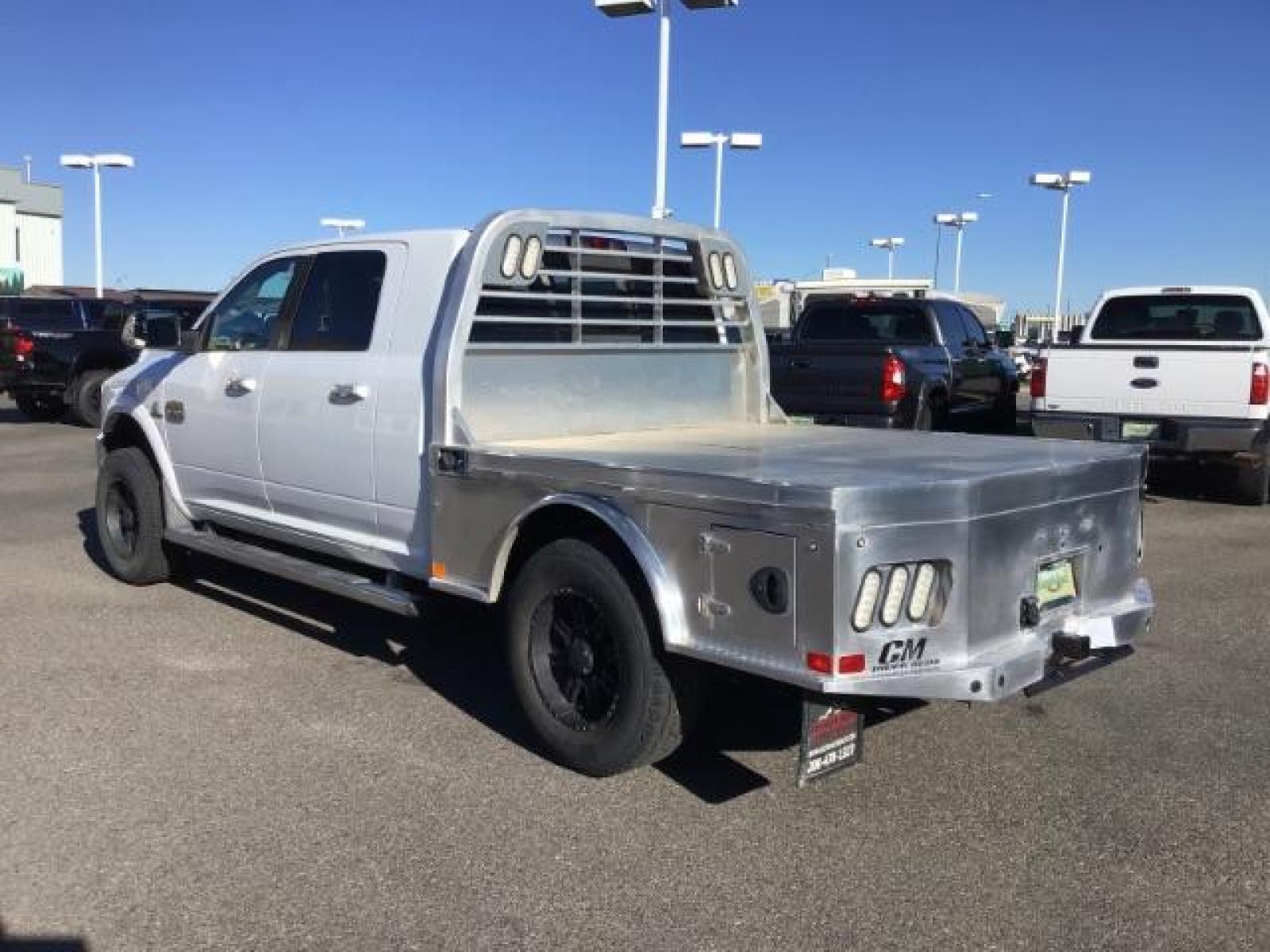 2015 Bright White Clear Coat /LEATHER RAM 2500 Longhorn Mega Cab SWB 4WD (3C6UR5PL9FG) with an 6.7L L6 OHV 24V TURBO DIESEL engine, 6-Speed Automatic transmission, located at 1235 N Woodruff Ave., Idaho Falls, 83401, (208) 523-1053, 43.507172, -112.000488 - Photo #2