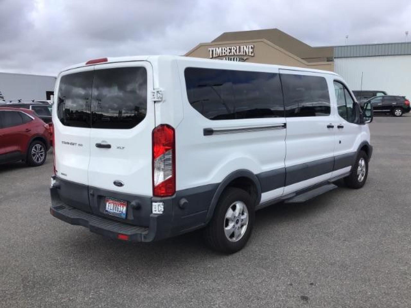 2018 WHITE /XL Ford Transit 350 Wagon Low Roof XL w/Sliding Pass. 148-in. WB (1FBZX2YG2JK) with an 3.5L V6 DOHC 24V engine, 6-Speed Automatic transmission, located at 1235 N Woodruff Ave., Idaho Falls, 83401, (208) 523-1053, 43.507172, -112.000488 - This 2018 Ford Transit Van, will seat up to 15 passengers. It has 74,000 miles. Comes with bluetooth and satellite radio. At Timberline Auto it is always easy to find a great deal on your next vehicle! Our experienced sales staff can help find the right vehicle that will fit your needs. Our knowle - Photo #4