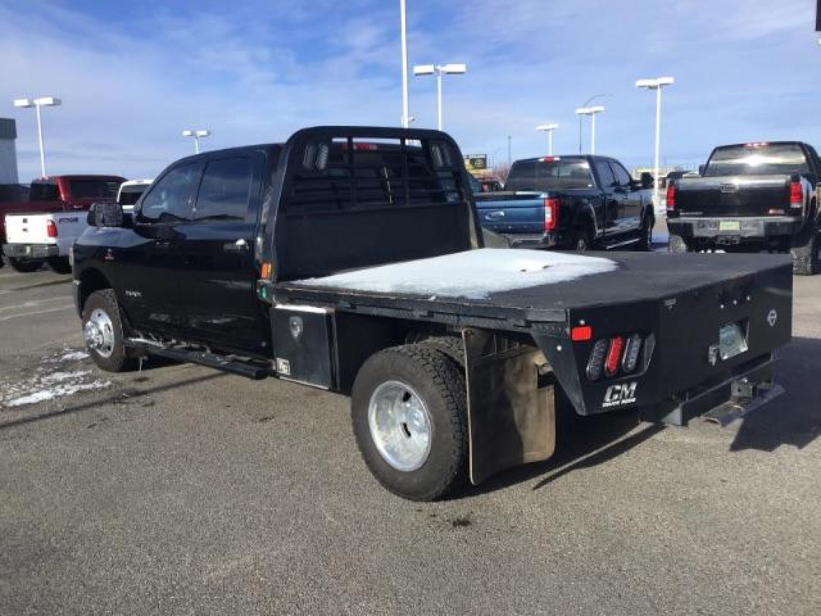 2020 BLACK /CLOTH RAM 3500 Tradesman Crew Cab 4WD DRW (3C63RRGL3LG) with an 6.7L L6 OHV 24V TURBO DIESEL engine, 6-Speed Automatic transmission, located at 1235 N Woodruff Ave., Idaho Falls, 83401, (208) 523-1053, 43.507172, -112.000488 - this 2020 Ram 3500 SLT, has a 6.7L Diesel motor. It has 105,000 miles. It comes with a flatbed with turnover ball. Comes with cloth interior, blue tooth audio, power door locks, power windows and integrated brake control. At Timberline Auto it is always easy to find a great deal on your next vehicle - Photo #2
