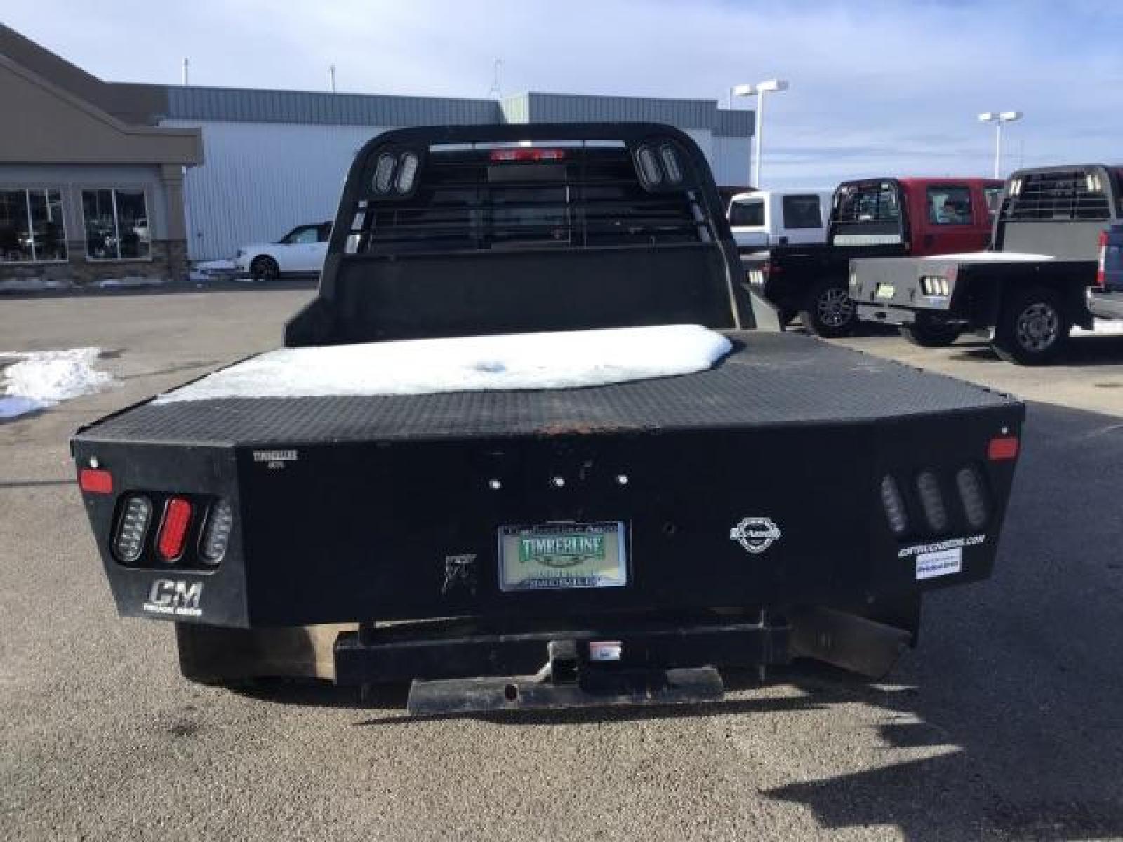2020 BLACK /CLOTH RAM 3500 Tradesman Crew Cab 4WD DRW (3C63RRGL3LG) with an 6.7L L6 OHV 24V TURBO DIESEL engine, 6-Speed Automatic transmission, located at 1235 N Woodruff Ave., Idaho Falls, 83401, (208) 523-1053, 43.507172, -112.000488 - this 2020 Ram 3500 SLT, has a 6.7L Diesel motor. It has 105,000 miles. It comes with a flatbed with turnover ball. Comes with cloth interior, blue tooth audio, power door locks, power windows and integrated brake control. At Timberline Auto it is always easy to find a great deal on your next vehicle - Photo #3