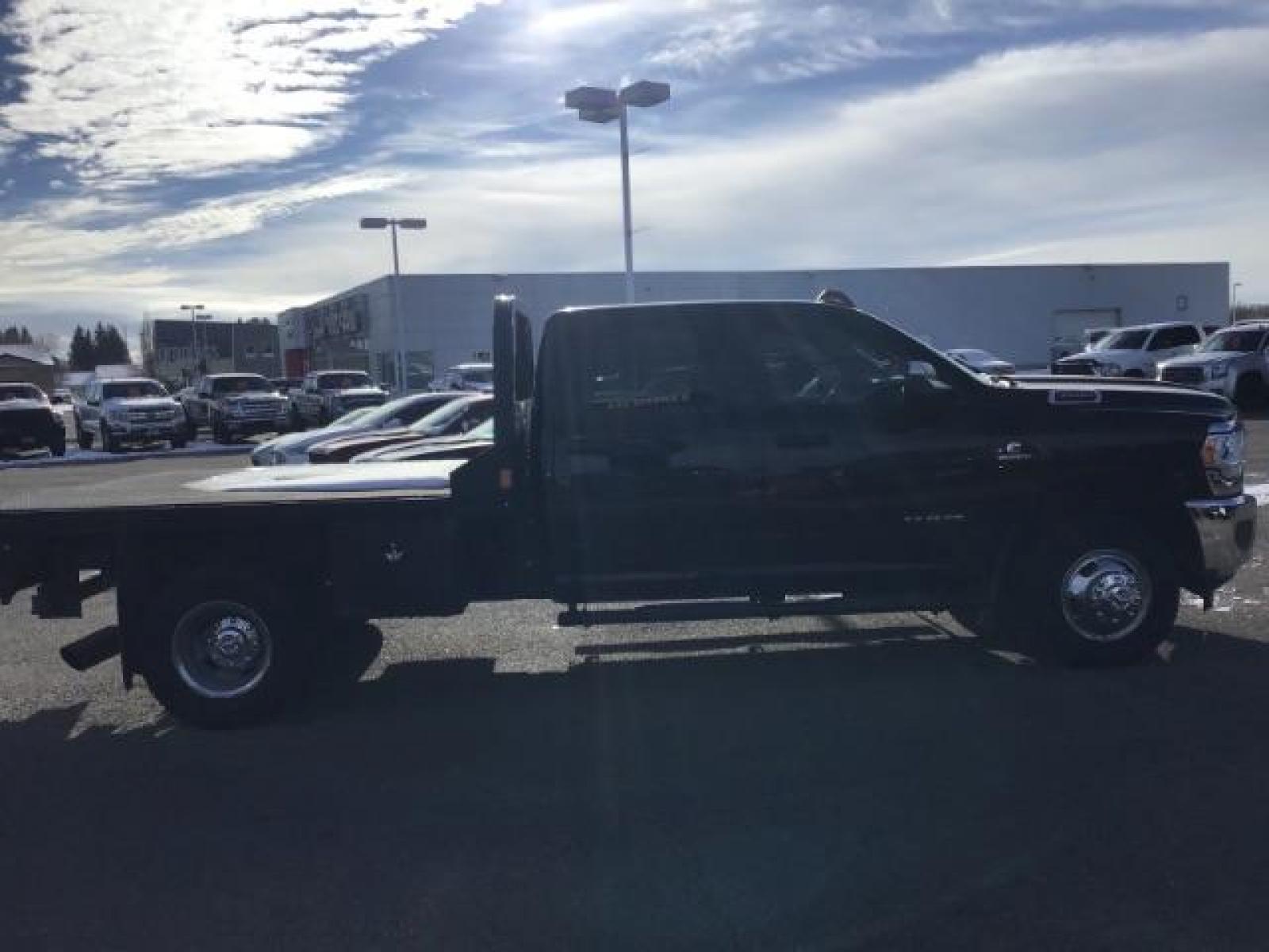 2020 BLACK /CLOTH RAM 3500 Tradesman Crew Cab 4WD DRW (3C63RRGL3LG) with an 6.7L L6 OHV 24V TURBO DIESEL engine, 6-Speed Automatic transmission, located at 1235 N Woodruff Ave., Idaho Falls, 83401, (208) 523-1053, 43.507172, -112.000488 - this 2020 Ram 3500 SLT, has a 6.7L Diesel motor. It has 105,000 miles. It comes with a flatbed with turnover ball. Comes with cloth interior, blue tooth audio, power door locks, power windows and integrated brake control. At Timberline Auto it is always easy to find a great deal on your next vehicle - Photo #5