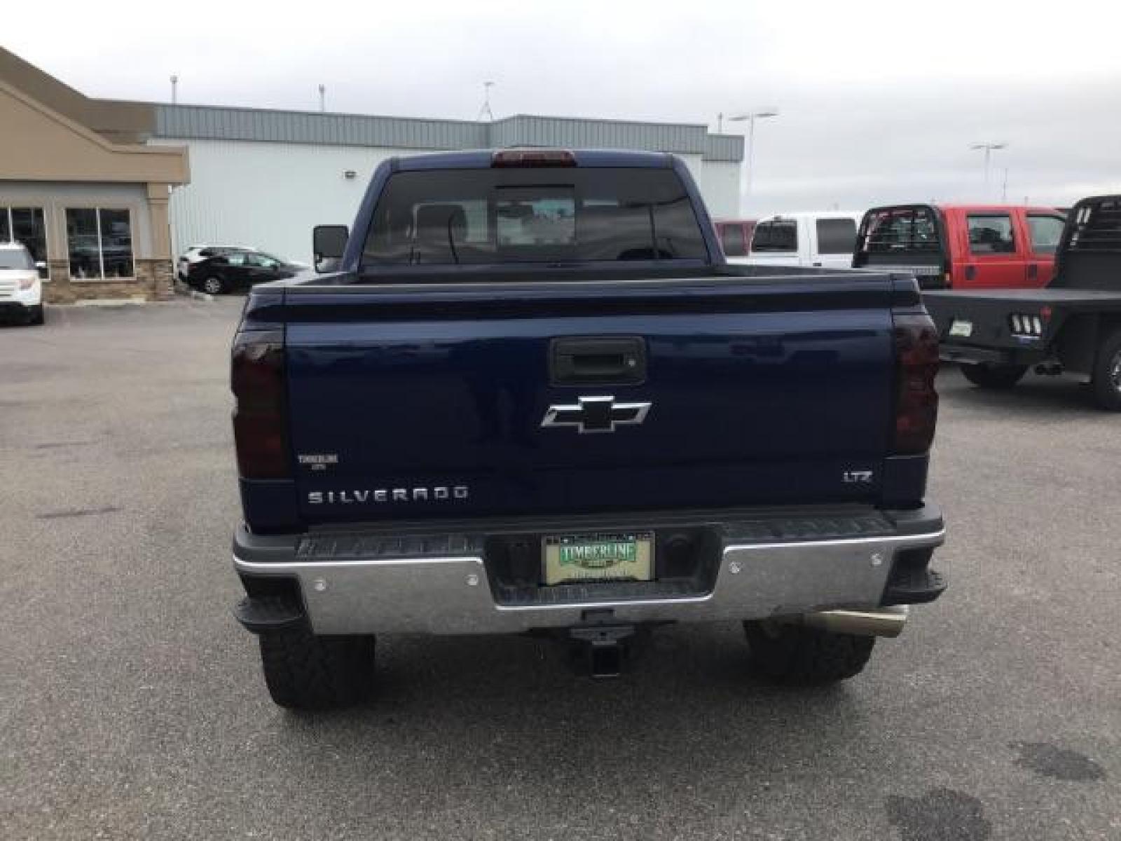 2016 Deep Ocean Blue Metallic /Cocoa/Dune, leather Chevrolet Silverado 3500HD LTZ Crew Cab 4WD (1GC4K0C86GF) with an 6.6L V8 OHV 32V TURBO DIESEL engine, 6-Speed Automatic transmission, located at 1235 N Woodruff Ave., Idaho Falls, 83401, (208) 523-1053, 43.507172, -112.000488 - This 2016 Chevrolet 3500 LTZ, has the 6.6L diesel motor. It has 160,031 miles. It comes with leather interior, tinted windows, back up camera, bluetooth, integrated trailer brake, and spray in bed liner. At Timberline Auto it is always easy to find a great deal on your next vehicle! Our experienced - Photo #3