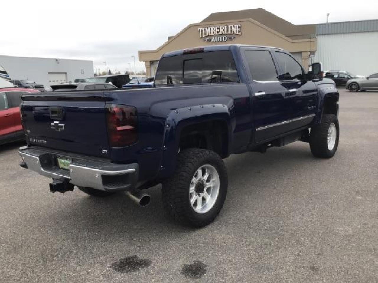 2016 Deep Ocean Blue Metallic /Cocoa/Dune, leather Chevrolet Silverado 3500HD LTZ Crew Cab 4WD (1GC4K0C86GF) with an 6.6L V8 OHV 32V TURBO DIESEL engine, 6-Speed Automatic transmission, located at 1235 N Woodruff Ave., Idaho Falls, 83401, (208) 523-1053, 43.507172, -112.000488 - This 2016 Chevrolet 3500 LTZ, has the 6.6L diesel motor. It has 160,031 miles. It comes with leather interior, tinted windows, back up camera, bluetooth, integrated trailer brake, and spray in bed liner. At Timberline Auto it is always easy to find a great deal on your next vehicle! Our experienced - Photo #4