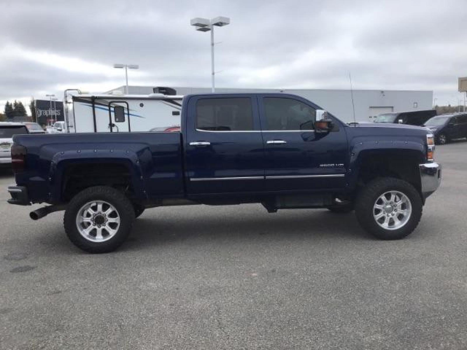 2016 Deep Ocean Blue Metallic /Cocoa/Dune, leather Chevrolet Silverado 3500HD LTZ Crew Cab 4WD (1GC4K0C86GF) with an 6.6L V8 OHV 32V TURBO DIESEL engine, 6-Speed Automatic transmission, located at 1235 N Woodruff Ave., Idaho Falls, 83401, (208) 523-1053, 43.507172, -112.000488 - This 2016 Chevrolet 3500 LTZ, has the 6.6L diesel motor. It has 160,031 miles. It comes with leather interior, tinted windows, back up camera, bluetooth, integrated trailer brake, and spray in bed liner. At Timberline Auto it is always easy to find a great deal on your next vehicle! Our experienced - Photo #5