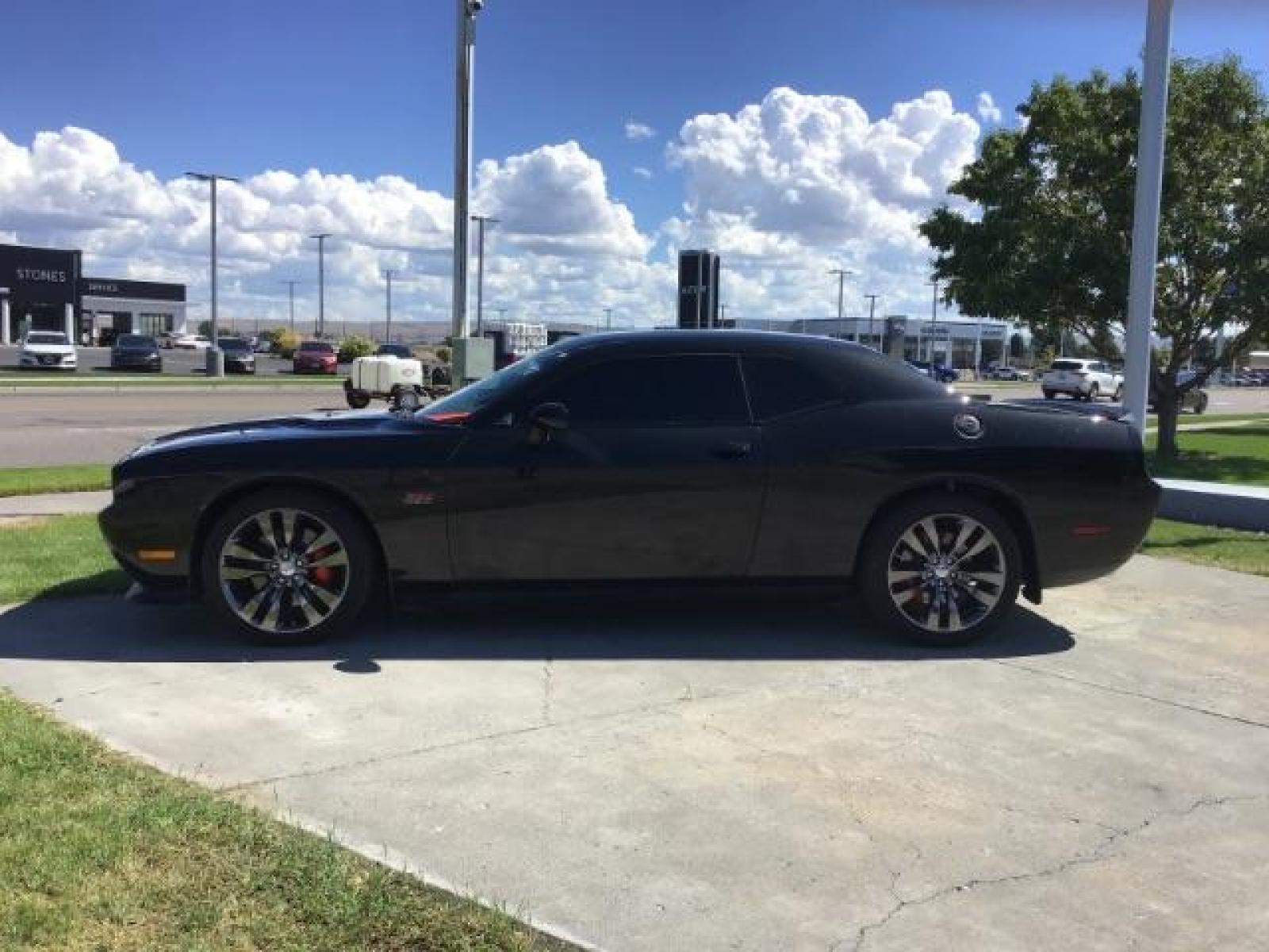 2014 Black Clearcoat /Radar Red/Dk Slate Gray Dodge Challenger SRT8 (2C3CDYCJ5EH) with an 6.4L V8 OHV 16V engine, 5-Speed Automatic transmission, located at 1235 N Woodruff Ave., Idaho Falls, 83401, (208) 523-1053, 43.507172, -112.000488 - Photo #1