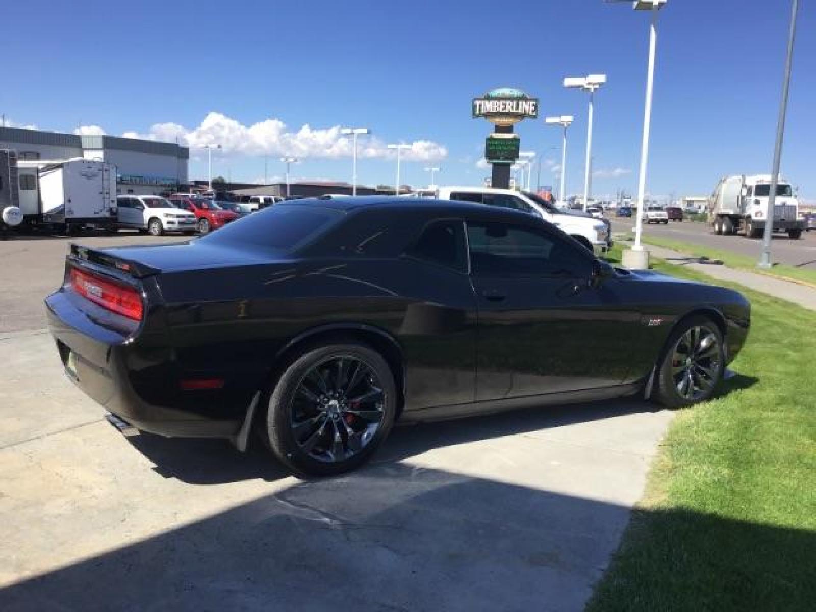2014 Black Clearcoat /Radar Red/Dk Slate Gray Dodge Challenger SRT8 (2C3CDYCJ5EH) with an 6.4L V8 OHV 16V engine, 5-Speed Automatic transmission, located at 1235 N Woodruff Ave., Idaho Falls, 83401, (208) 523-1053, 43.507172, -112.000488 - Photo #4