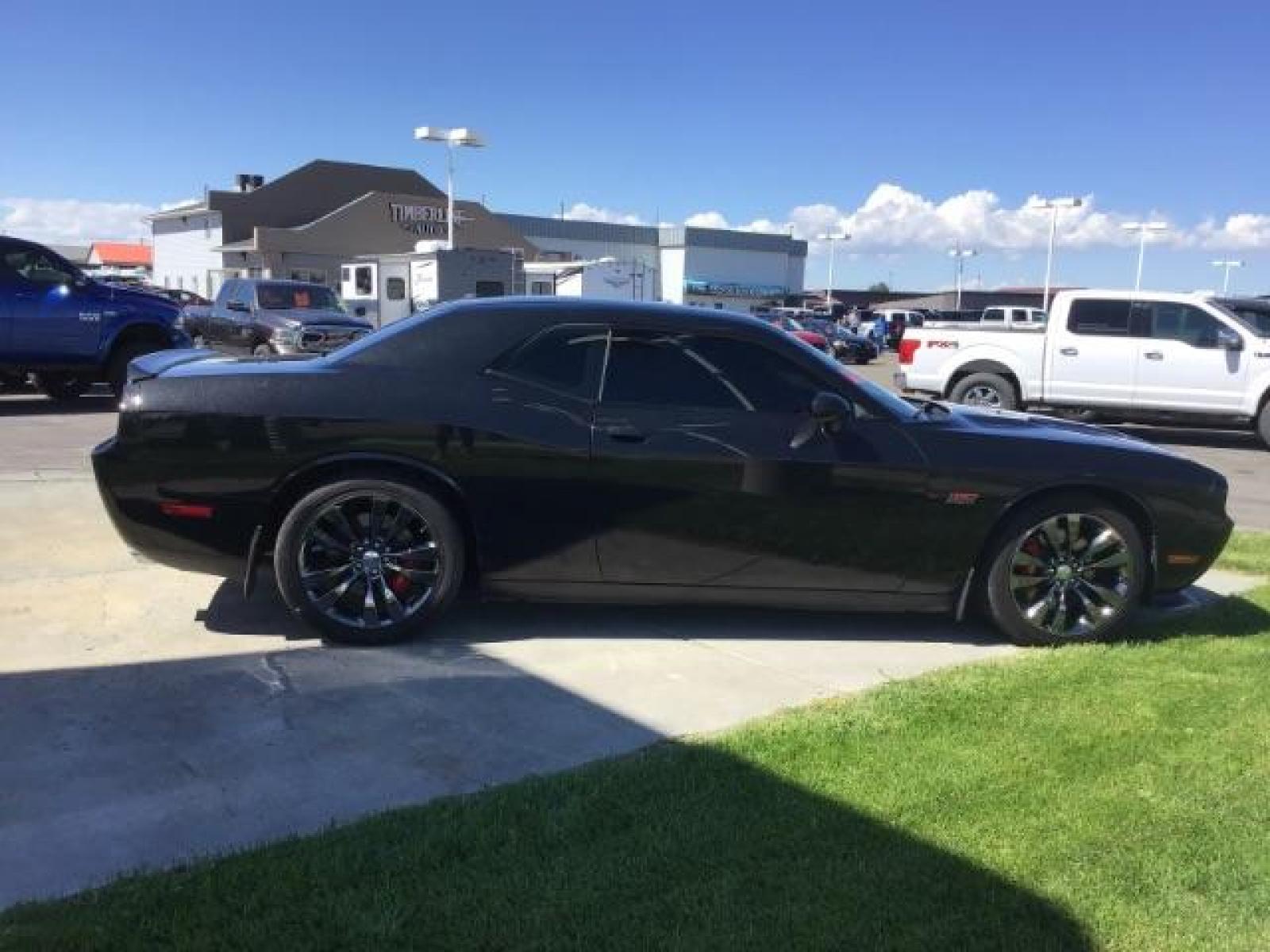 2014 Black Clearcoat /Radar Red/Dk Slate Gray Dodge Challenger SRT8 (2C3CDYCJ5EH) with an 6.4L V8 OHV 16V engine, 5-Speed Automatic transmission, located at 1235 N Woodruff Ave., Idaho Falls, 83401, (208) 523-1053, 43.507172, -112.000488 - Photo #5