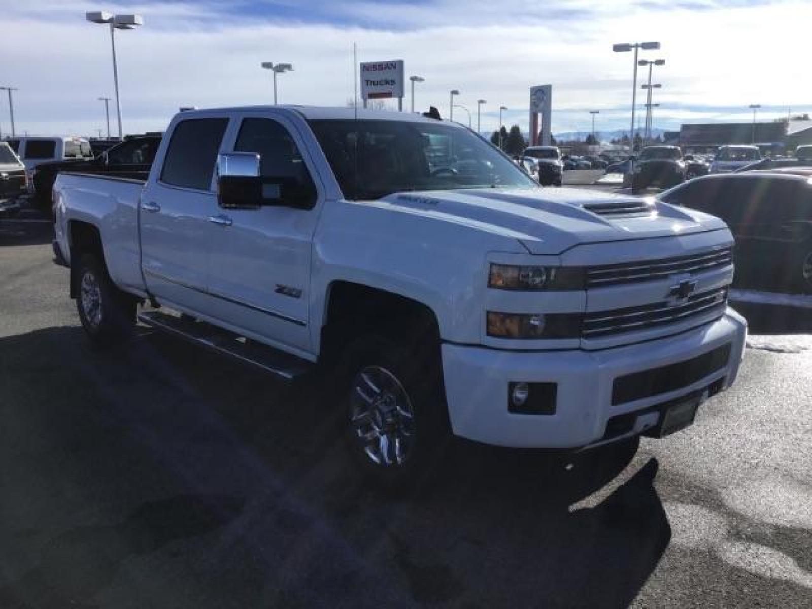 2017 Summit White /Jet Black, leather Chevrolet Silverado 3500HD LTZ Crew Cab 4WD (1GC4K0CY2HF) with an 6.6L V8 OHV 32V TURBO DIESEL engine, 6-Speed Automatic transmission, located at 1235 N Woodruff Ave., Idaho Falls, 83401, (208) 523-1053, 43.507172, -112.000488 - This 2017 Chevrolet 3500HD 4x4 Z71 LTZ, has the 6.6L diesel motor. It has 42,847 miles. It has leather interior, heated seats, sunroof, spray in bedliner, back up camera, also comes with a turnover ball. At Timberline Auto it is always easy to find a great deal on your next vehicle! Our experienced - Photo #6