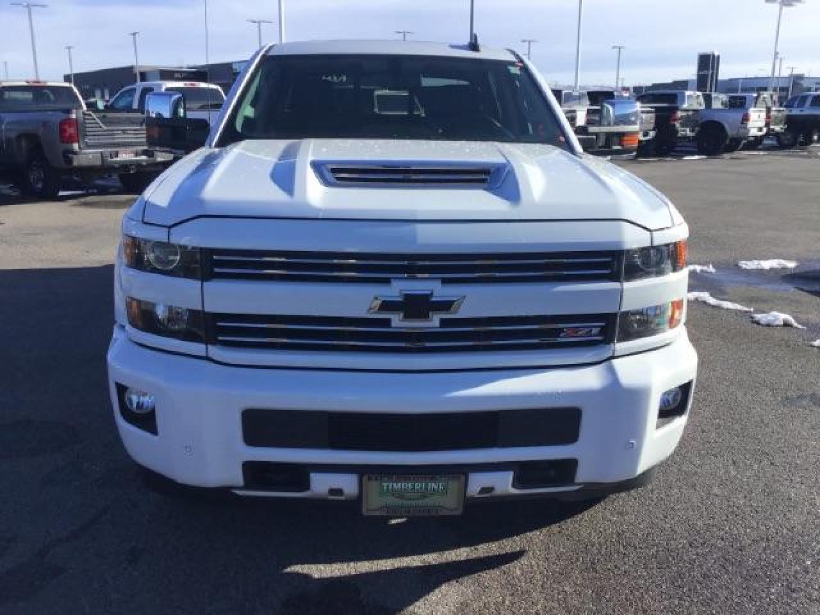 2017 Summit White /Jet Black, leather Chevrolet Silverado 3500HD LTZ Crew Cab 4WD (1GC4K0CY2HF) with an 6.6L V8 OHV 32V TURBO DIESEL engine, 6-Speed Automatic transmission, located at 1235 N Woodruff Ave., Idaho Falls, 83401, (208) 523-1053, 43.507172, -112.000488 - This 2017 Chevrolet 3500HD 4x4 Z71 LTZ, has the 6.6L diesel motor. It has 42,847 miles. It has leather interior, heated seats, sunroof, spray in bedliner, back up camera, also comes with a turnover ball. At Timberline Auto it is always easy to find a great deal on your next vehicle! Our experienced - Photo #7