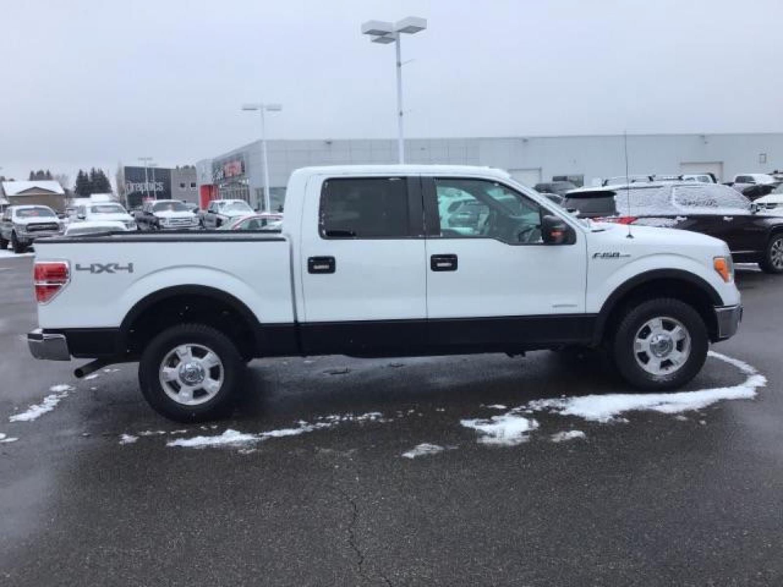 2013 WHITE /CLOTH Ford F-150 XLT SuperCrew 5.5-ft. Bed 4WD (1FTFW1ET9DF) with an 3.5L V6 TURBO engine, 6-Speed Automatic transmission, located at 1235 N Woodruff Ave., Idaho Falls, 83401, (208) 523-1053, 43.507172, -112.000488 - This 2013 Ford F150 XLT 4x4, has the 3.5L ecoboost motor. It has 138,000 miles. It comes with cloth seats, blue tooth audio, power door locks, power windows, and cruise control. At Timberline Auto it is always easy to find a great deal on your next vehicle! Our experienced sales staff can help find - Photo #5