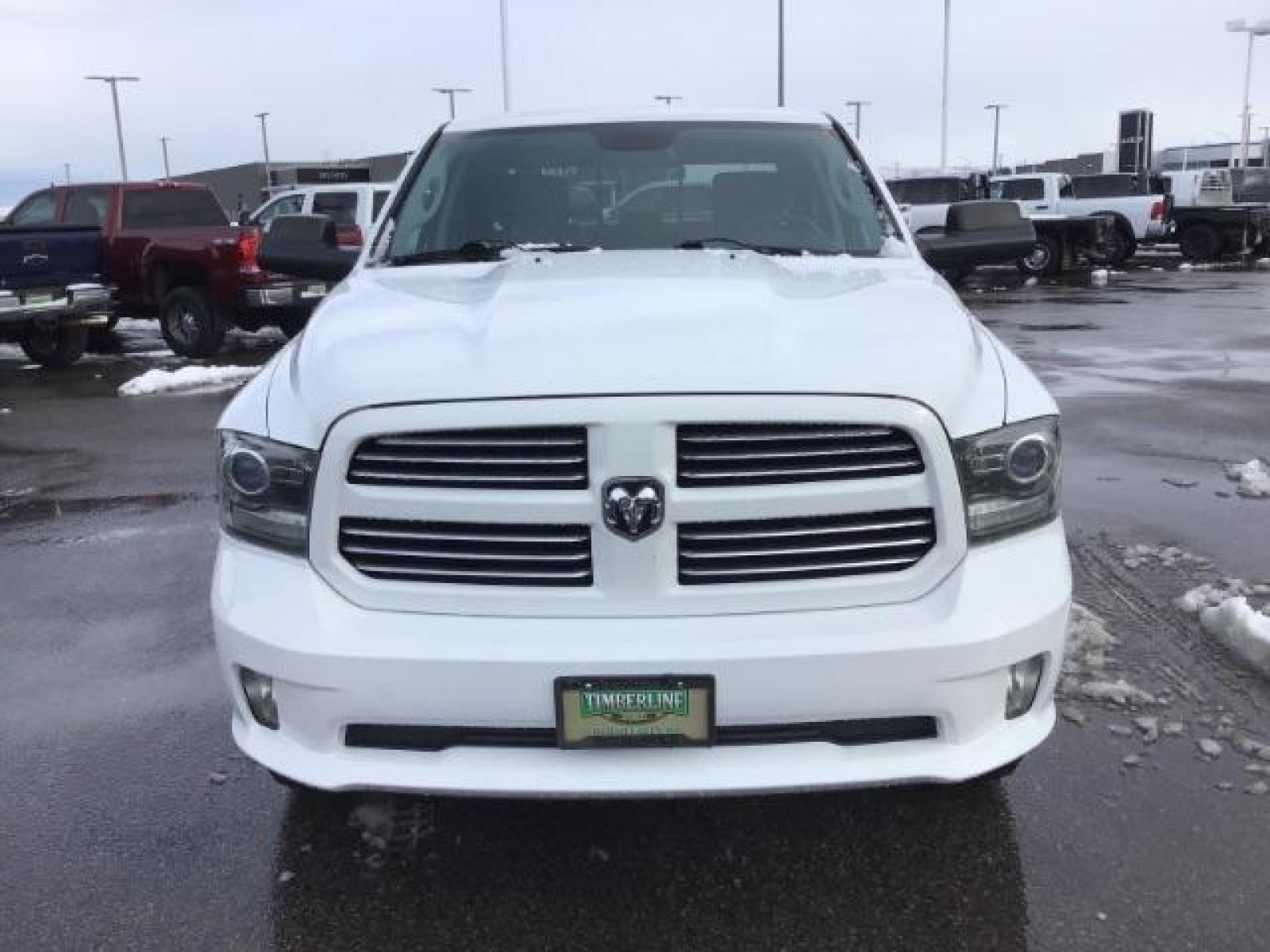 2014 Bright White Clearcoat /Black RAM 1500 Sport Crew Cab LWB 4WD (1C6RR7UT5ES) with an 5.7L V8 OHV 16V engine, 8-Speed Automatic transmission, located at 1235 N Woodruff Ave., Idaho Falls, 83401, (208) 523-1053, 43.507172, -112.000488 - This 2014 Ram 1500 Sport 4x4, has the 5.7L Hemi motor. It has 115,000 miles. Comes with leather interior, heated and cooled seats, power seats, blue tooth audio, back up camera, and power windows and locks. At Timberline Auto it is always easy to find a great deal on your next vehicle! Our experienc - Photo #7