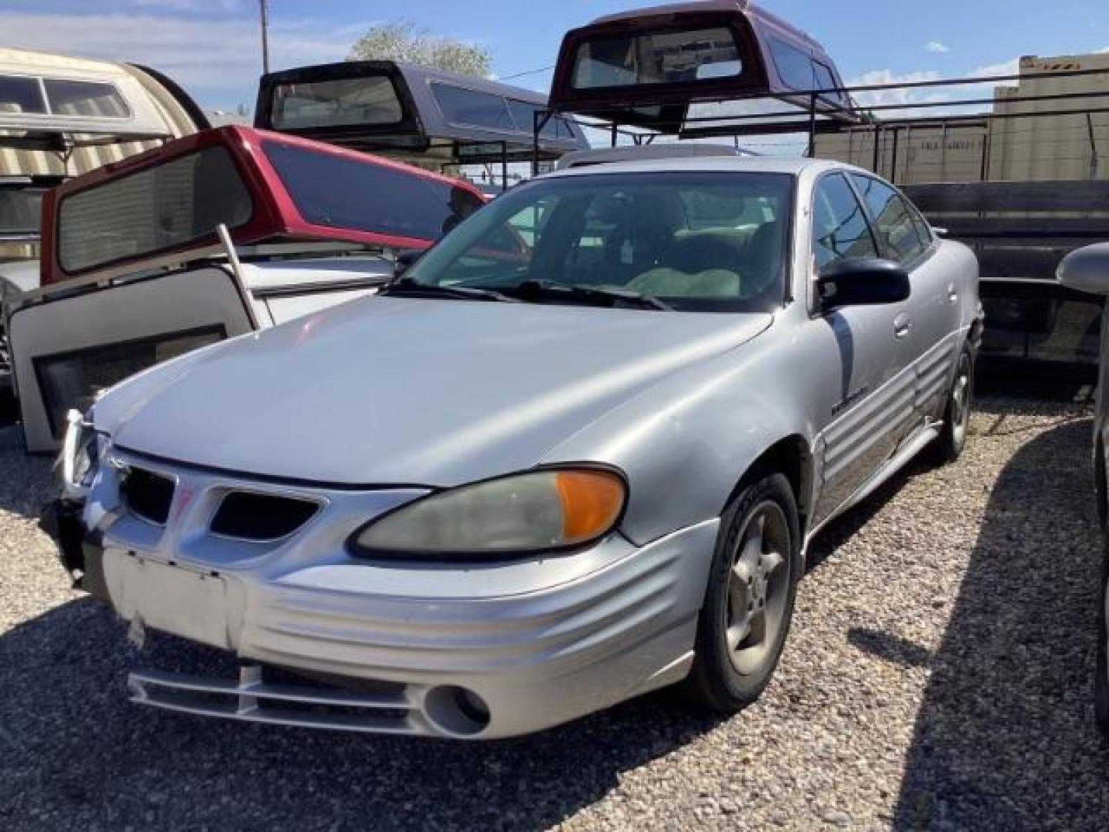 2001 Galaxy Silver Metallic /Dark Pewter Cloth Pontiac Grand AM SE1 sedan (1G2NF52T31M) with an 2.4L L4 DOHC 16V engine, 4-Speed Automatic transmission, located at 1235 N Woodruff Ave., Idaho Falls, 83401, (208) 523-1053, 43.507172, -112.000488 - At Timberline Auto it is always easy to find a great deal on your next vehicle! Our experienced sales staff can help find the right vehicle will fit your needs. Our knowledgeable finance department has options for almost any credit score. We offer many warranty contract options to protect you new pr - Photo #0