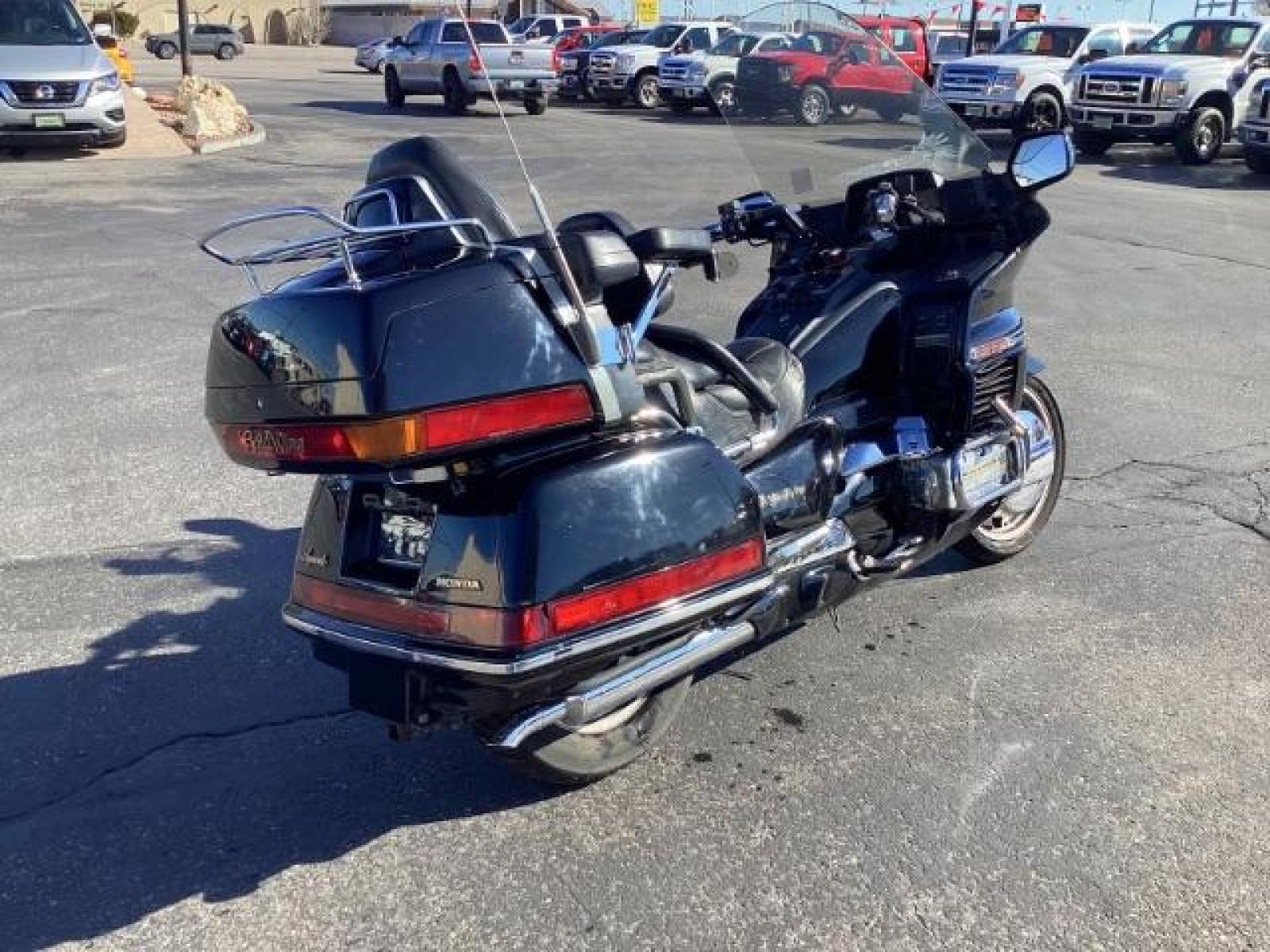 1991 BLACK Honda GL1500A - (1HFSC2206MA) with an 1520CC engine, located at 1235 N Woodruff Ave., Idaho Falls, 83401, (208) 523-1053, 43.507172, -112.000488 - The 1991 Honda GL1500A, also known as the Honda Gold Wing Aspencade, is a touring motorcycle that was known for its comfort, performance, and array of features. Here are some of the notable features of the 1991 GL1500A: Engine: The GL1500A is powered by a liquid-cooled, horizontally opposed six-cyl - Photo #4