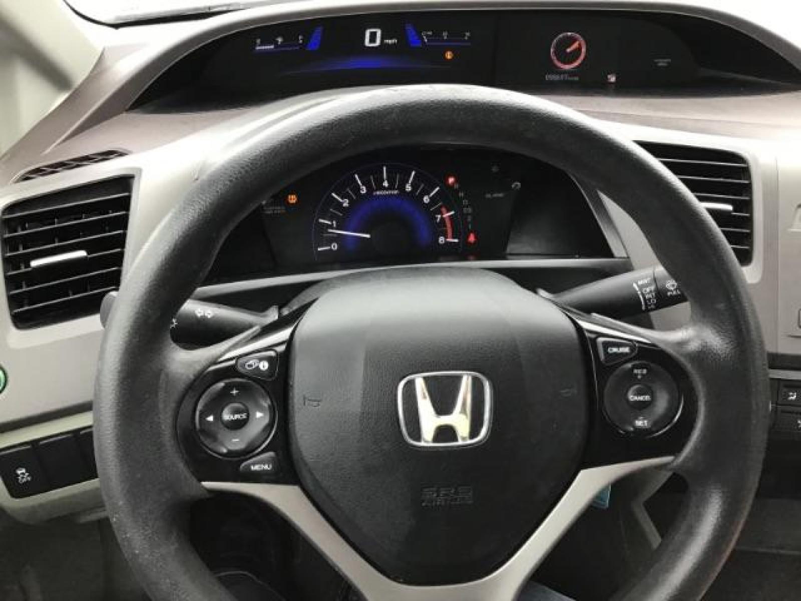 2012 Taffeta White /Gray Cloth Interior Honda Civic LX Sedan 5-Speed AT (19XFB2F54CE) with an 1.8L L4 SOHC 16V engine, 5-Speed Automatic transmission, located at 1235 N Woodruff Ave., Idaho Falls, 83401, (208) 523-1053, 43.507172, -112.000488 - This 2012 Honda Civic LX, has 98,000 miles. Comes with cloth interior, cruise control, power windows and locks, and AM/FM CD stereo. At Timberline Auto it is always easy to find a great deal on your next vehicle! Our experienced sales staff can help find the right vehicle will fit your needs. Our kn - Photo #13