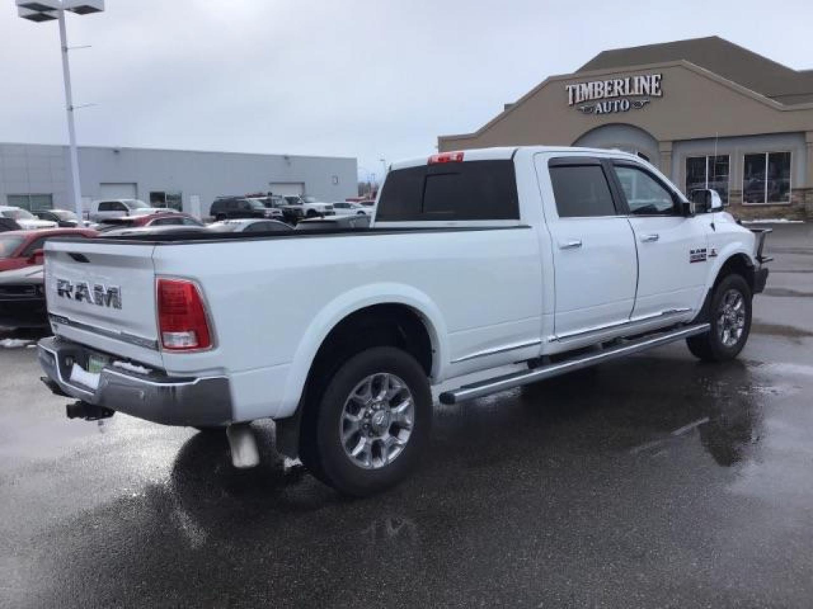 2017 Pearl White /Black/Cattle Tan, premium leather RAM 3500 Longhorn Crew Cab LWB 4WD (3C63R3KL4HG) with an 6.7L L6 OHV 24V TURBO DIESEL engine, 6-Speed Automatic transmission, located at 1235 N Woodruff Ave., Idaho Falls, 83401, (208) 523-1053, 43.507172, -112.000488 - This 2017 Ram 3500 Limited 4x4, has the 6.7L diesel motor. It has 99,000 miles. Comes with leather interior, heated and cooled seats, dual power seats, custom front bumper, back up camera, turnover ball, and blue tooth audio. At Timberline Auto it is always easy to find a great deal on your next ve - Photo #4