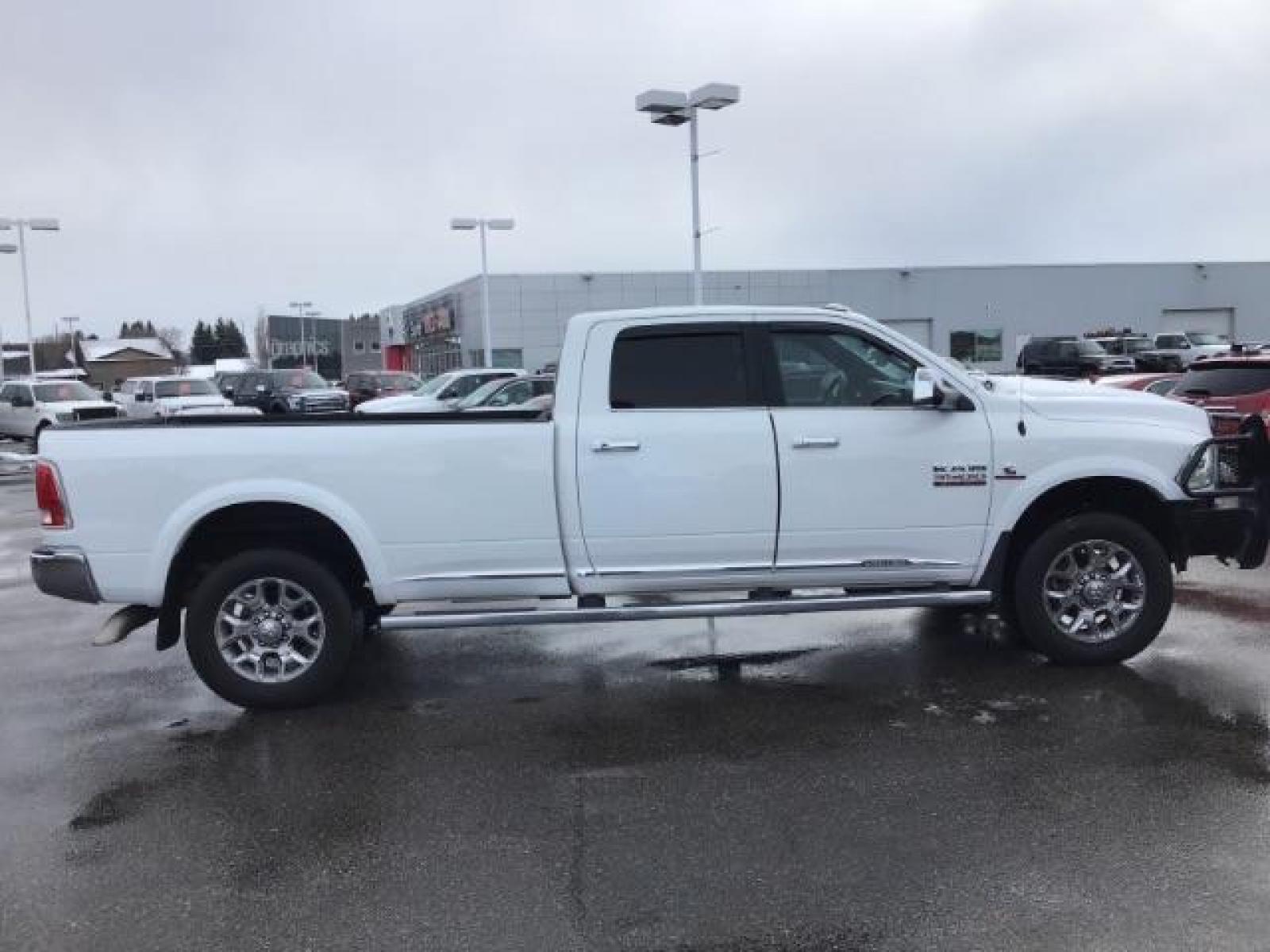 2017 Pearl White /Black/Cattle Tan, premium leather RAM 3500 Longhorn Crew Cab LWB 4WD (3C63R3KL4HG) with an 6.7L L6 OHV 24V TURBO DIESEL engine, 6-Speed Automatic transmission, located at 1235 N Woodruff Ave., Idaho Falls, 83401, (208) 523-1053, 43.507172, -112.000488 - This 2017 Ram 3500 Limited 4x4, has the 6.7L diesel motor. It has 99,000 miles. Comes with leather interior, heated and cooled seats, dual power seats, custom front bumper, back up camera, turnover ball, and blue tooth audio. At Timberline Auto it is always easy to find a great deal on your next ve - Photo #5