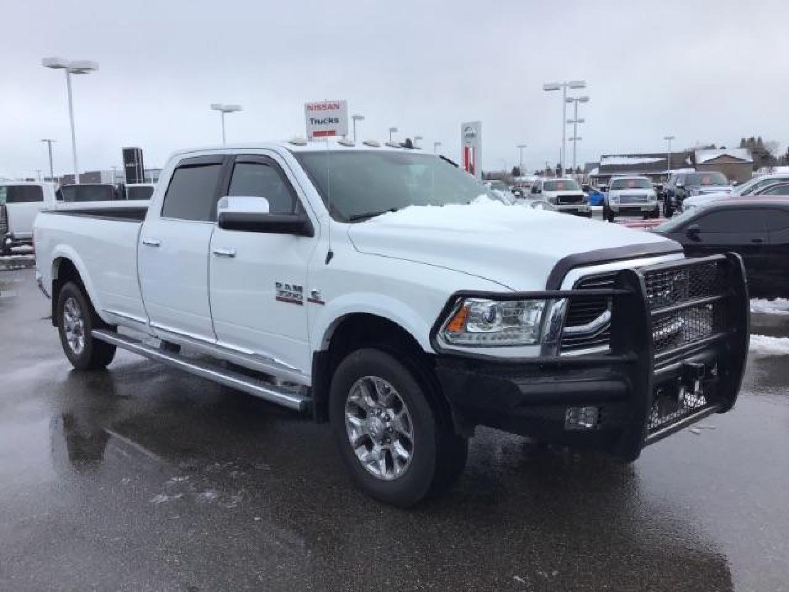2017 Pearl White /Black/Cattle Tan, premium leather RAM 3500 Longhorn Crew Cab LWB 4WD (3C63R3KL4HG) with an 6.7L L6 OHV 24V TURBO DIESEL engine, 6-Speed Automatic transmission, located at 1235 N Woodruff Ave., Idaho Falls, 83401, (208) 523-1053, 43.507172, -112.000488 - This 2017 Ram 3500 Limited 4x4, has the 6.7L diesel motor. It has 99,000 miles. Comes with leather interior, heated and cooled seats, dual power seats, custom front bumper, back up camera, turnover ball, and blue tooth audio. At Timberline Auto it is always easy to find a great deal on your next ve - Photo #6