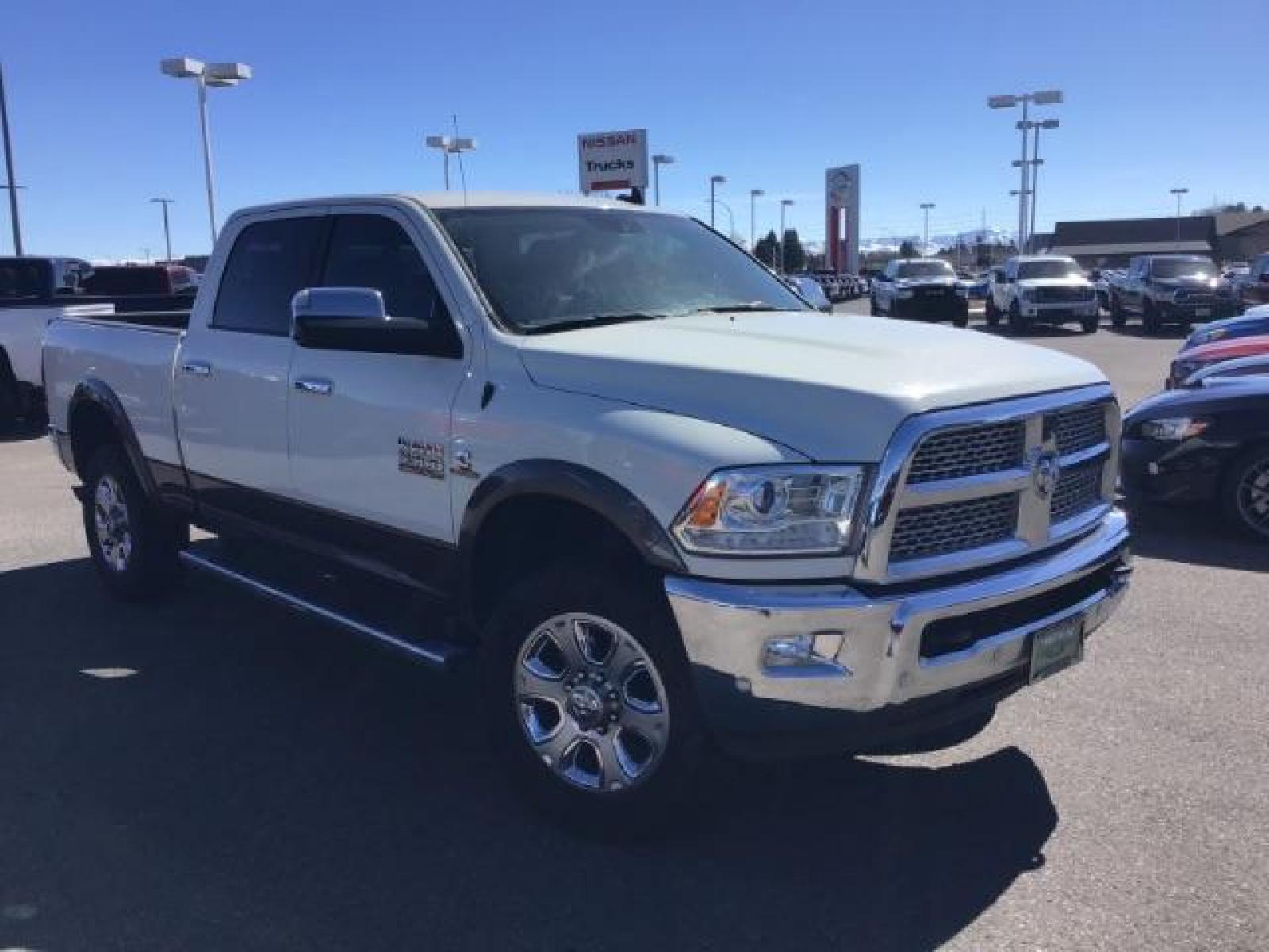 2017 WHITE /Black, leather RAM 3500 Laramie Crew Cab SWB 4WD (3C63R3EL0HG) with an 6.7L L6 OHV 24V TURBO DIESEL engine, 6-Speed Automatic transmission, located at 1235 N Woodruff Ave., Idaho Falls, 83401, (208) 523-1053, 43.507172, -112.000488 - This 2017 Ram 3500 Laramie 4x4, has the 6.7L cummins motor. It has 116,000 miles. Comes with leather interior, heated and cooled seats, dual power seats, navigation, back up camera, spray in bedliner, and blue tooth audio. At Timberline Auto it is always easy to find a great deal on your next vehicl - Photo #6