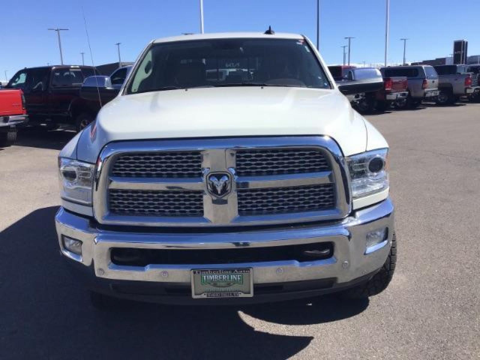 2017 WHITE /Black, leather RAM 3500 Laramie Crew Cab SWB 4WD (3C63R3EL0HG) with an 6.7L L6 OHV 24V TURBO DIESEL engine, 6-Speed Automatic transmission, located at 1235 N Woodruff Ave., Idaho Falls, 83401, (208) 523-1053, 43.507172, -112.000488 - This 2017 Ram 3500 Laramie 4x4, has the 6.7L cummins motor. It has 116,000 miles. Comes with leather interior, heated and cooled seats, dual power seats, navigation, back up camera, spray in bedliner, and blue tooth audio. At Timberline Auto it is always easy to find a great deal on your next vehicl - Photo #7