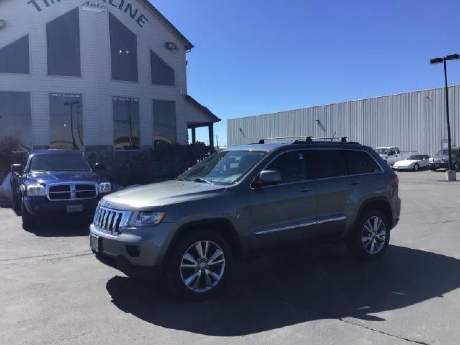 2013 Jeep Grand Cherokee Laredo 4WD (1C4RJFAG5DC) with an 3.6L V6 DOHC 24V engine, 5-Speed Automatic transmission, located at 1235 N Woodruff Ave., Idaho Falls, 83401, (208) 523-1053, 43.507172, -112.000488 - This Jeep Grand Cherokee Laredo 4x4 , has the 3.2L V6 motor. It has 150,000 miles. It comes with leather interior, cruise control, back up camera, powered seats, and power windows and locks. At Timberline Auto it is always easy to find a great deal on your next vehicle! Our experienced sales staff c - Photo #0