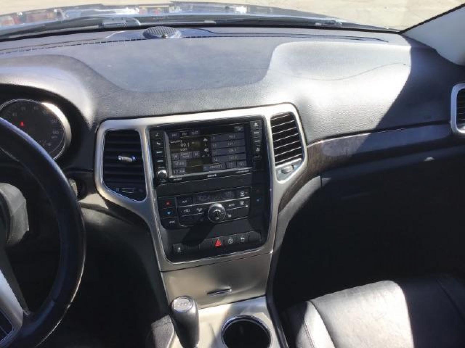 2013 Jeep Grand Cherokee Laredo 4WD (1C4RJFAG5DC) with an 3.6L V6 DOHC 24V engine, 5-Speed Automatic transmission, located at 1235 N Woodruff Ave., Idaho Falls, 83401, (208) 523-1053, 43.507172, -112.000488 - This Jeep Grand Cherokee Laredo 4x4 , has the 3.2L V6 motor. It has 150,000 miles. It comes with leather interior, cruise control, back up camera, powered seats, and power windows and locks. At Timberline Auto it is always easy to find a great deal on your next vehicle! Our experienced sales staff c - Photo #10