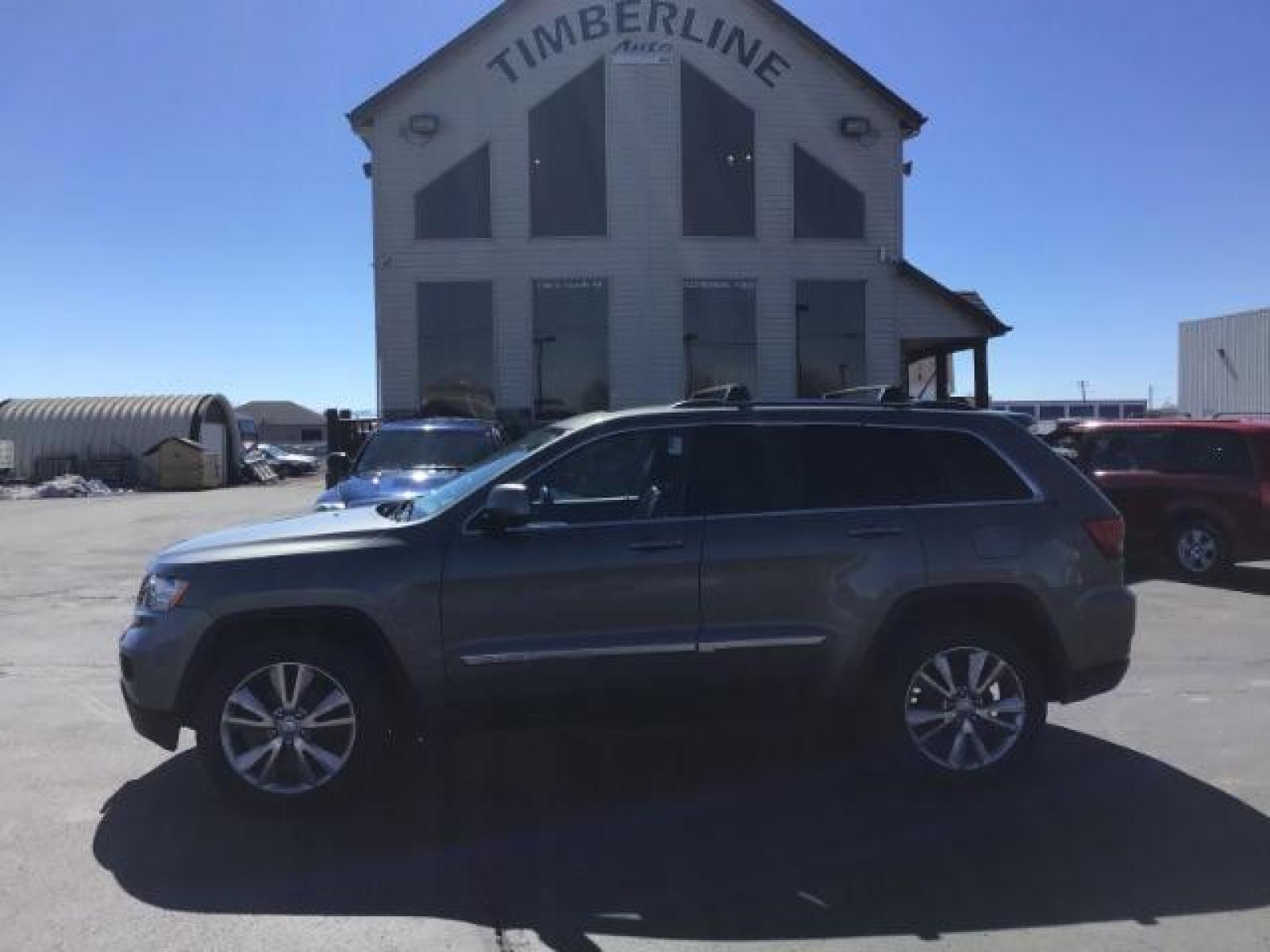 2013 Jeep Grand Cherokee Laredo 4WD (1C4RJFAG5DC) with an 3.6L V6 DOHC 24V engine, 5-Speed Automatic transmission, located at 1235 N Woodruff Ave., Idaho Falls, 83401, (208) 523-1053, 43.507172, -112.000488 - This Jeep Grand Cherokee Laredo 4x4 , has the 3.2L V6 motor. It has 150,000 miles. It comes with leather interior, cruise control, back up camera, powered seats, and power windows and locks. At Timberline Auto it is always easy to find a great deal on your next vehicle! Our experienced sales staff c - Photo #1
