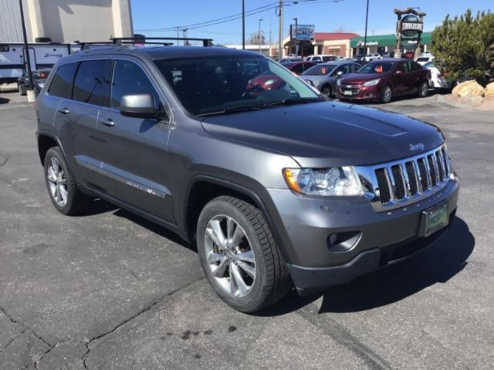 2013 Jeep Grand Cherokee Laredo 4WD (1C4RJFAG5DC) with an 3.6L V6 DOHC 24V engine, 5-Speed Automatic transmission, located at 1235 N Woodruff Ave., Idaho Falls, 83401, (208) 523-1053, 43.507172, -112.000488 - This Jeep Grand Cherokee Laredo 4x4 , has the 3.2L V6 motor. It has 150,000 miles. It comes with leather interior, cruise control, back up camera, powered seats, and power windows and locks. At Timberline Auto it is always easy to find a great deal on your next vehicle! Our experienced sales staff c - Photo #6