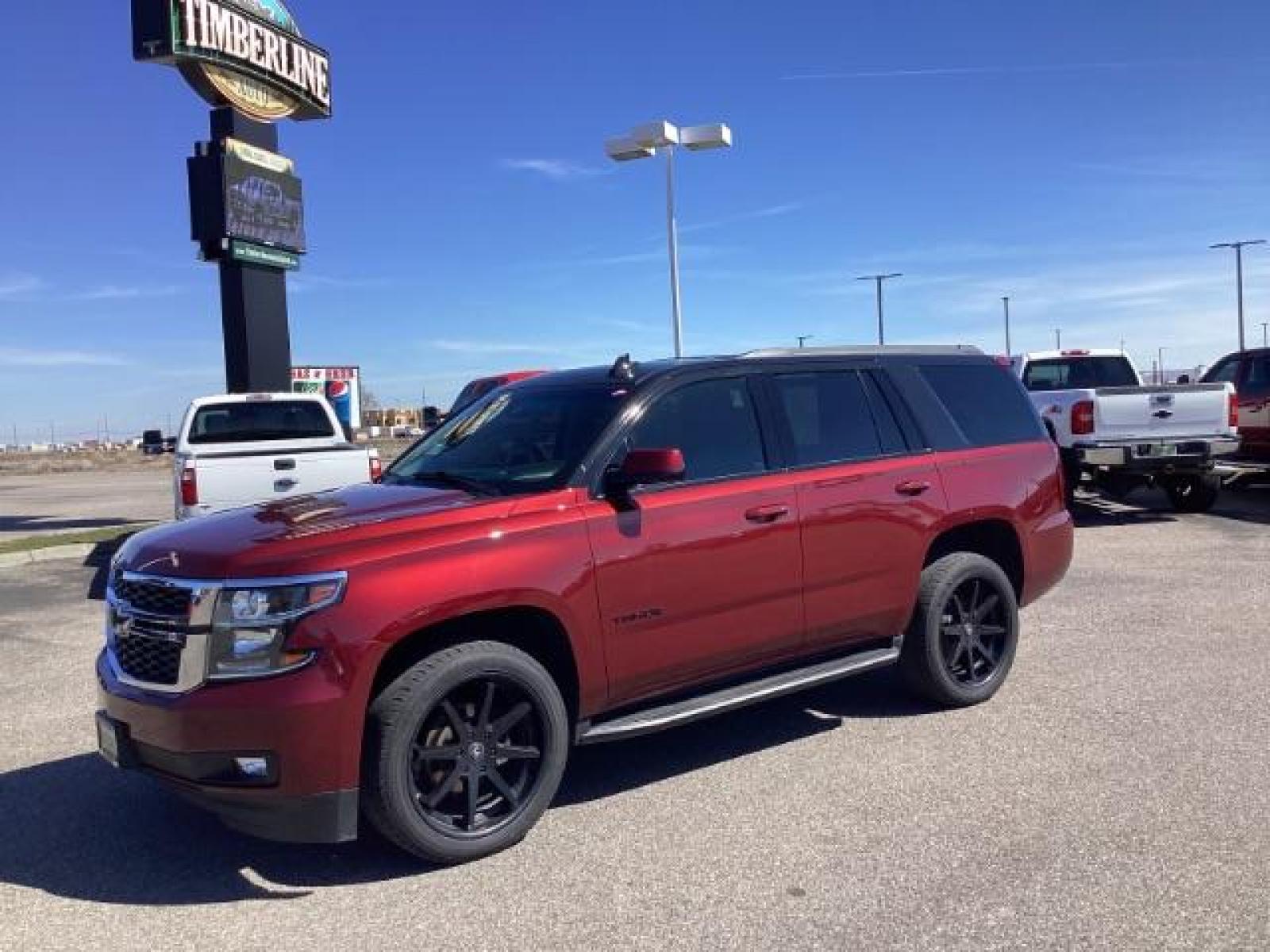 2020 Black Cherry Metallic /Jet Black, leather Chevrolet Tahoe LT 4WD (1GNSKBKC7LR) with an 5.3L V8 OHV 16V engine, 6-Speed Automatic transmission, located at 1235 N Woodruff Ave., Idaho Falls, 83401, (208) 523-1053, 43.507172, -112.000488 - The 2020 Chevrolet Tahoe LT is a well-equipped trim level of the popular full-size SUV. It comes with a range of features designed to provide comfort, convenience, safety, and performance. Here are some of the notable features you might find on the 2020 Chevy Tahoe LT: V8 Engine: The Tahoe LT typic - Photo #0