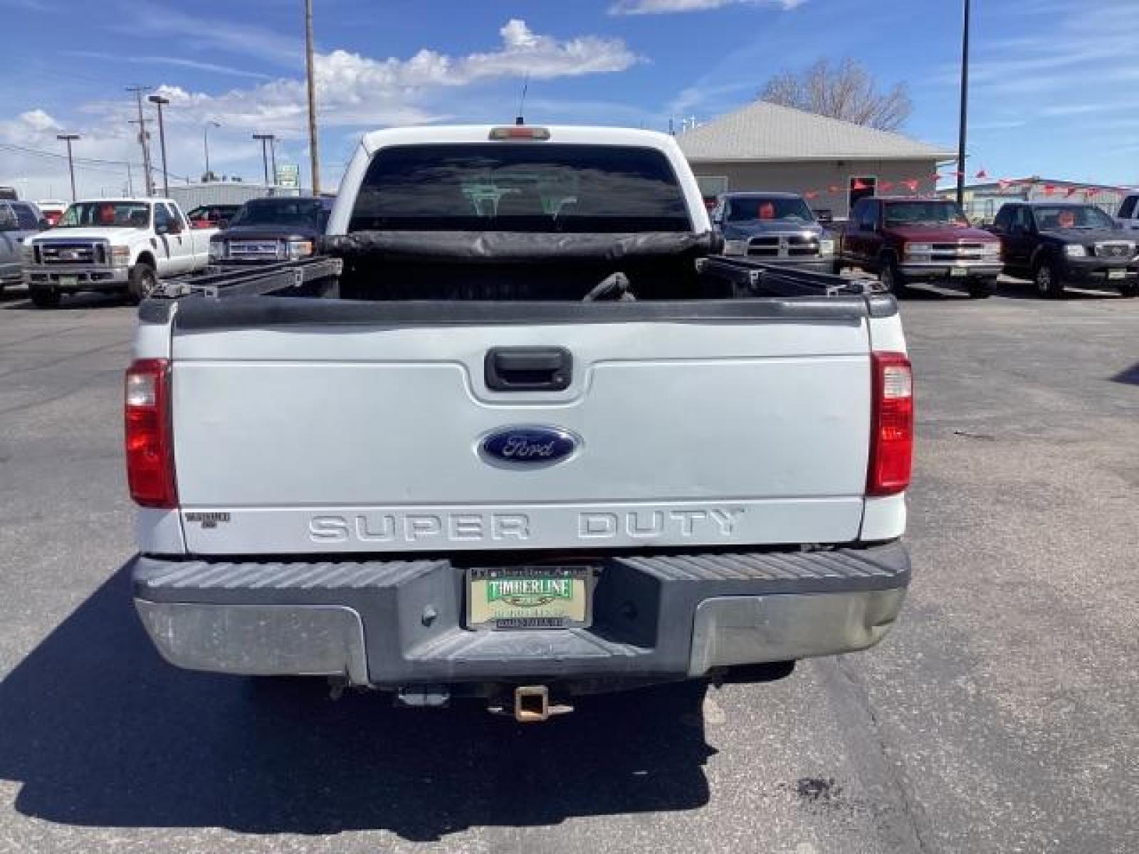 2012 Oxford White /Steel Cloth Interior Ford F-250 SD XL Crew Cab Long Bed 4WD (1FT7W2B64CE) with an 6.2L V8 OHV 16V engine, 6-Speed Automatic transmission, located at 1235 N Woodruff Ave., Idaho Falls, 83401, (208) 523-1053, 43.507172, -112.000488 - The 2011 Ford F-250 XL is a sturdy and capable truck designed for heavy-duty work. Here are the key features you can expect to find in the gas-powered XL trim: Engine Option: 6.2-liter V8 engine producing around 385 horsepower and 405 lb-ft of torque. Transmission: Most models come with a six-spe - Photo #3