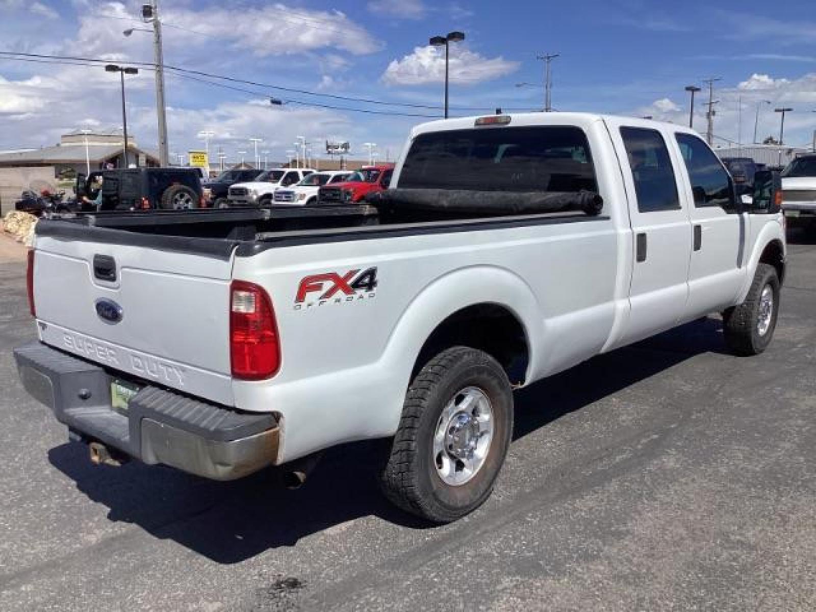 2012 Oxford White /Steel Cloth Interior Ford F-250 SD XL Crew Cab Long Bed 4WD (1FT7W2B64CE) with an 6.2L V8 OHV 16V engine, 6-Speed Automatic transmission, located at 1235 N Woodruff Ave., Idaho Falls, 83401, (208) 523-1053, 43.507172, -112.000488 - The 2011 Ford F-250 XL is a sturdy and capable truck designed for heavy-duty work. Here are the key features you can expect to find in the gas-powered XL trim: Engine Option: 6.2-liter V8 engine producing around 385 horsepower and 405 lb-ft of torque. Transmission: Most models come with a six-spe - Photo #4