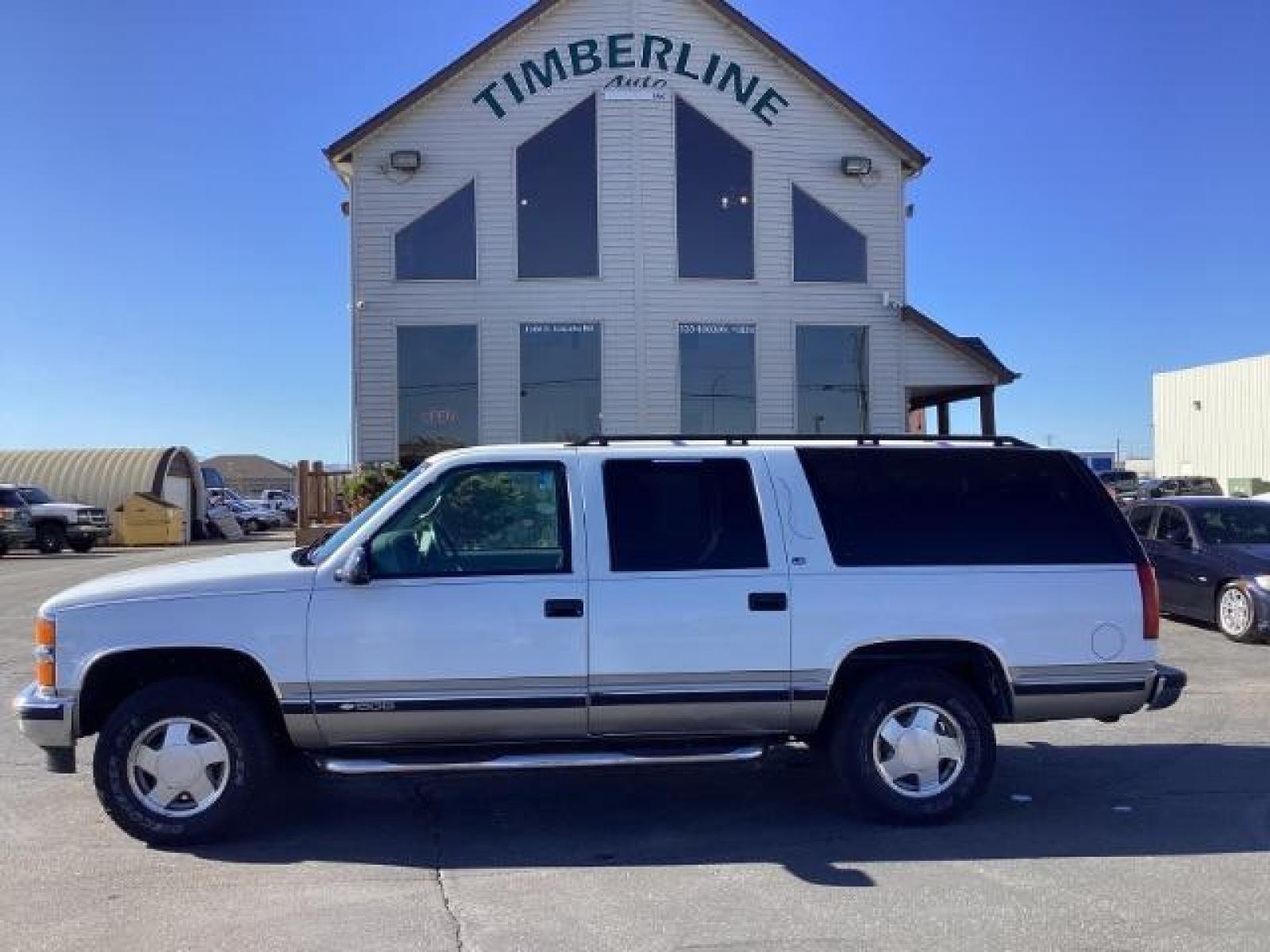 1999 Chevrolet Suburban K1500 4WD (1GNFK16R8XJ) with an 5.7L V8 OHV 16V engine, 4-Speed Automatic transmission, located at 1235 N Woodruff Ave., Idaho Falls, 83401, (208) 523-1053, 43.507172, -112.000488 - The 1999 Chevrolet Suburban LS was a rugged and versatile full-size SUV that offered a range of features suitable for families, towing, and outdoor activities. Here are some of the key features you might find on the 1999 Chevrolet Suburban LS: V8 Engine: Typically equipped with a powerful V8 engine - Photo #1