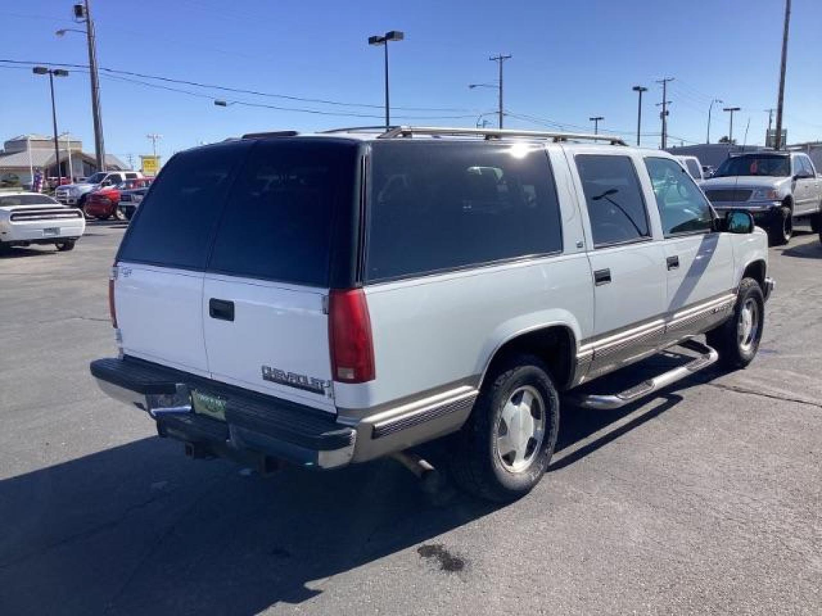 1999 Chevrolet Suburban K1500 4WD (1GNFK16R8XJ) with an 5.7L V8 OHV 16V engine, 4-Speed Automatic transmission, located at 1235 N Woodruff Ave., Idaho Falls, 83401, (208) 523-1053, 43.507172, -112.000488 - The 1999 Chevrolet Suburban LS was a rugged and versatile full-size SUV that offered a range of features suitable for families, towing, and outdoor activities. Here are some of the key features you might find on the 1999 Chevrolet Suburban LS: V8 Engine: Typically equipped with a powerful V8 engine - Photo #4