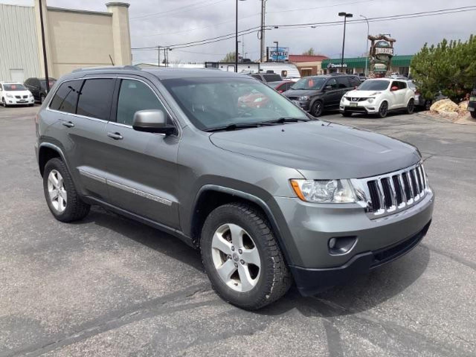 2012 Mineral Gray Metallic Jeep Grand Cherokee Laredo 4WD (1C4RJFAG3CC) with an 3.6L V6 DOHC 24V engine, 5-Speed Automatic transmission, located at 1235 N Woodruff Ave., Idaho Falls, 83401, (208) 523-1053, 43.507172, -112.000488 - The 2012 Jeep Grand Cherokee Laredo 4x4 offers a range of features suitable for both on-road comfort and off-road capability. Here are some of the key features you might find on this model: Engine Options: The Grand Cherokee Laredo might come with a choice of engines, including a V6 or V8 engine. T - Photo #6