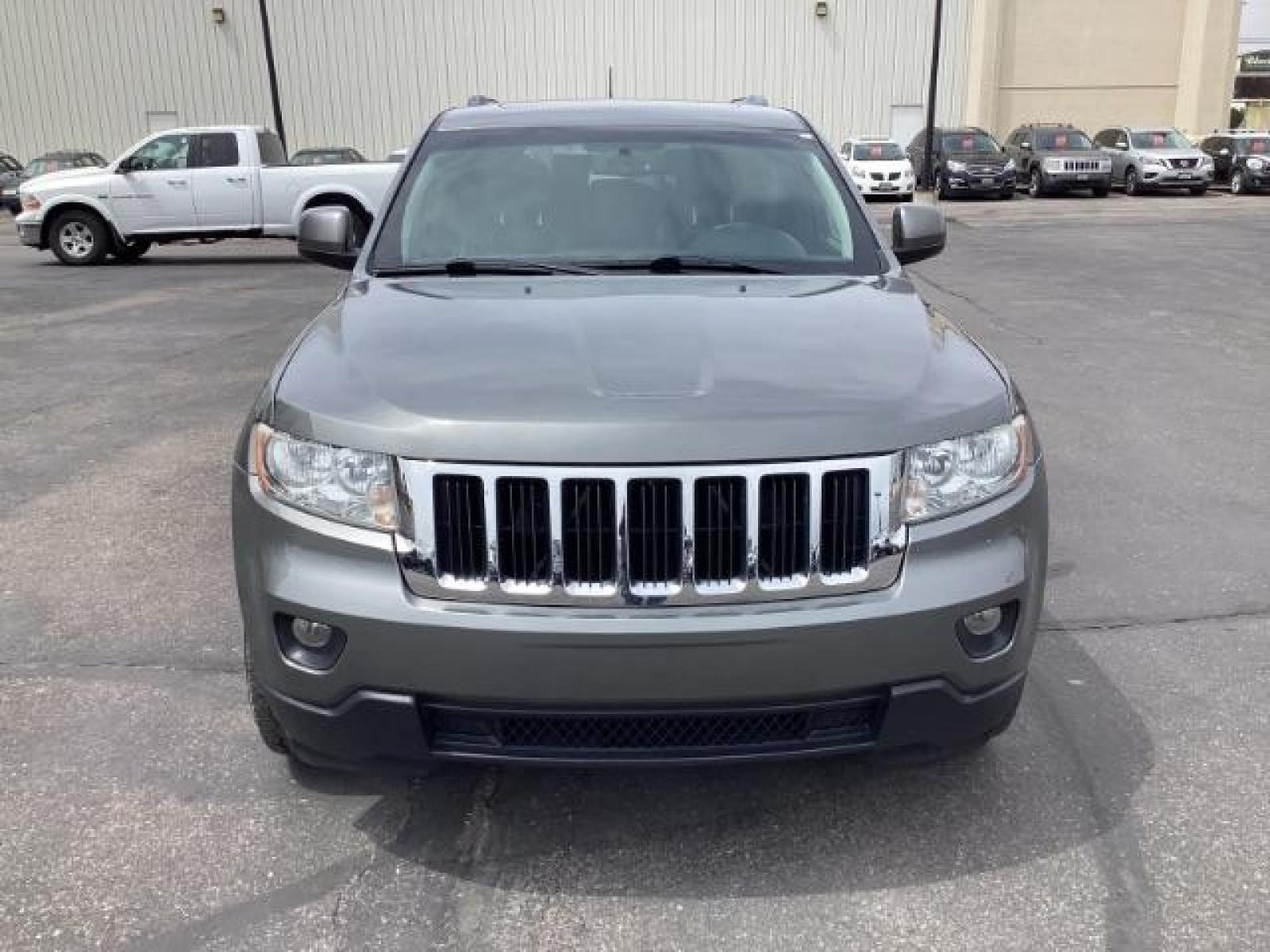 2012 Mineral Gray Metallic Jeep Grand Cherokee Laredo 4WD (1C4RJFAG3CC) with an 3.6L V6 DOHC 24V engine, 5-Speed Automatic transmission, located at 1235 N Woodruff Ave., Idaho Falls, 83401, (208) 523-1053, 43.507172, -112.000488 - Photo #7